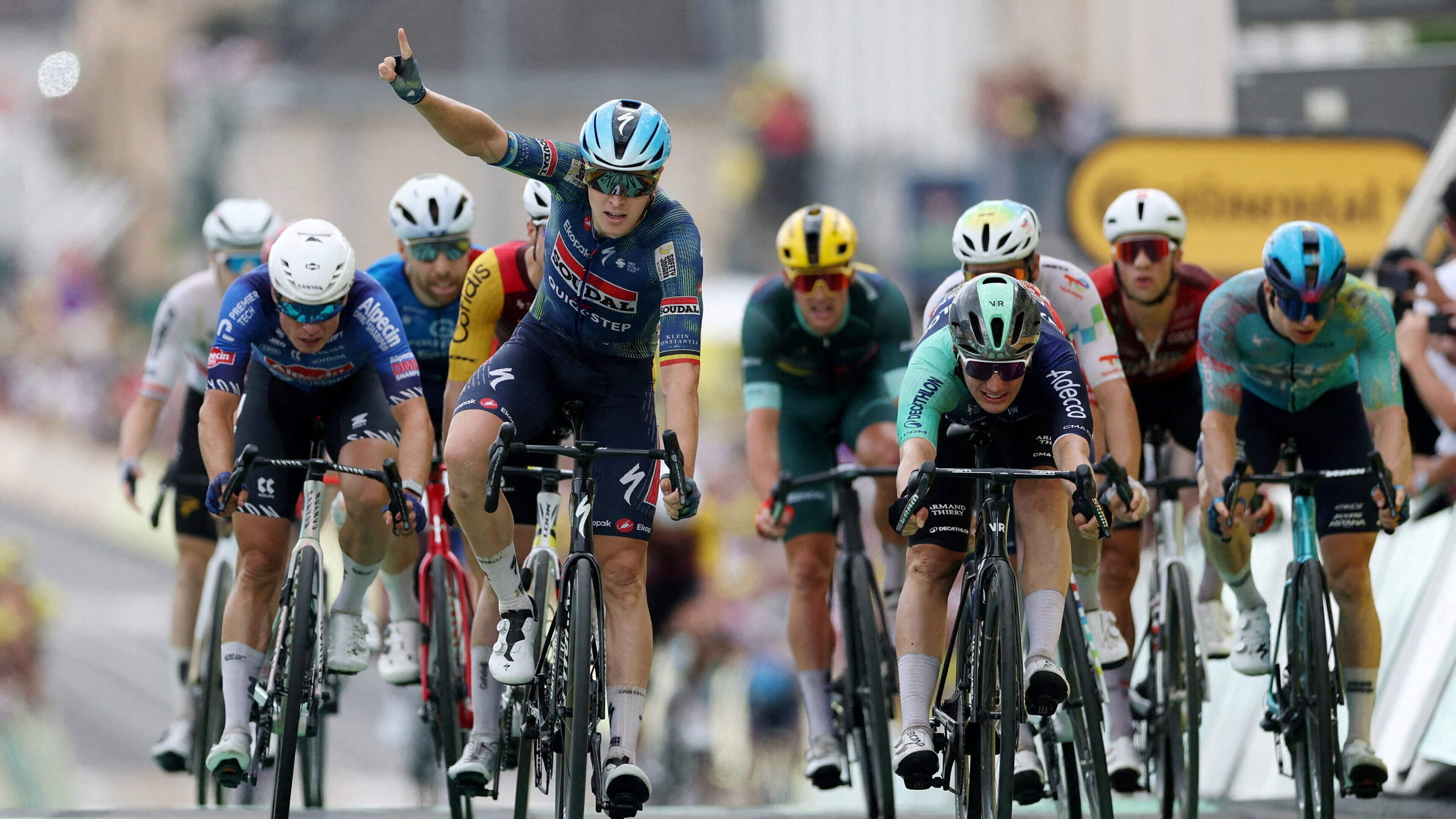 Tim Merlier sprints to third stage win at this year’s Tour de France after avoiding crash chaos  