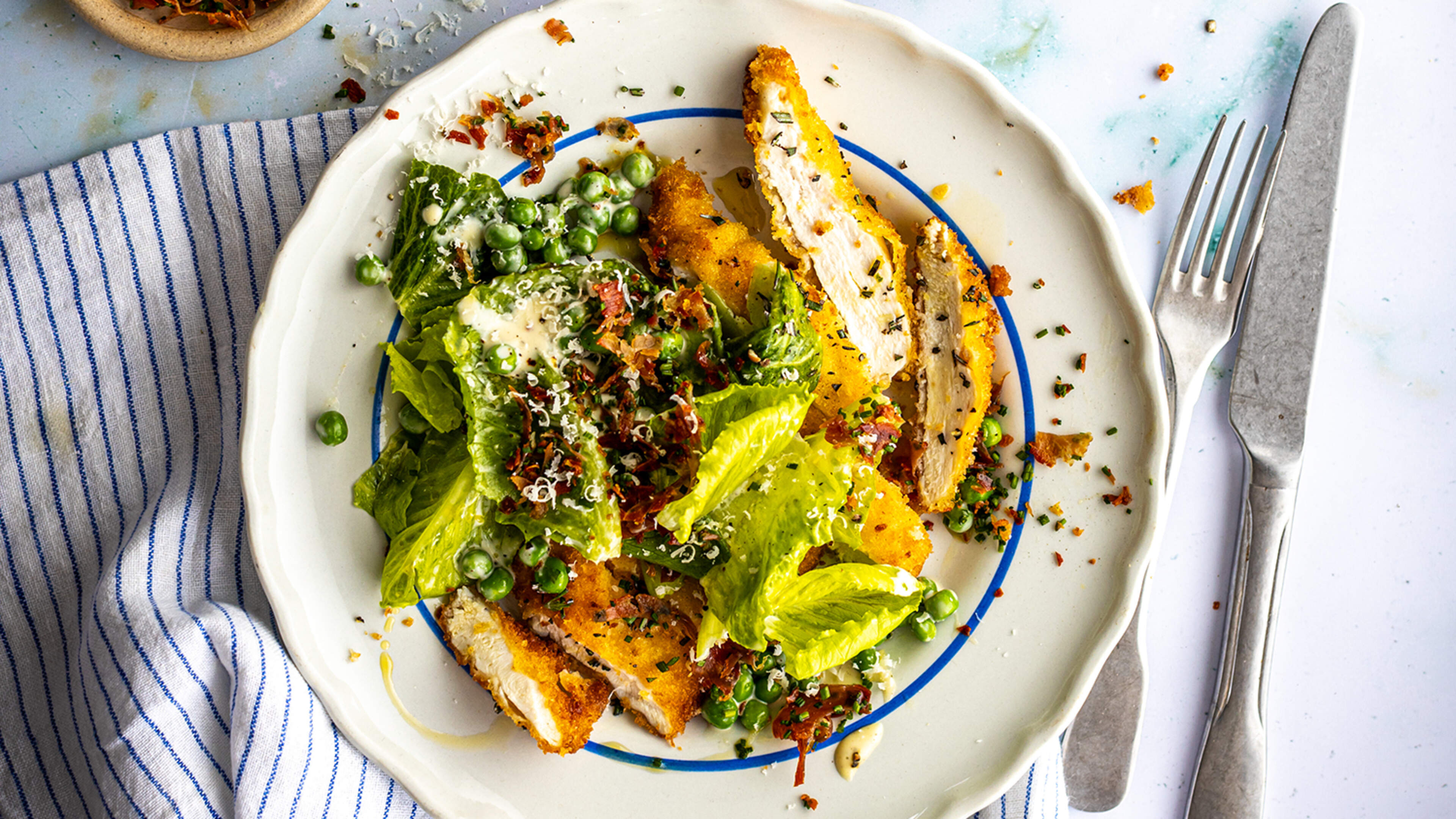 Rosemary & Garlic Chicken Schnitzel with Pea Caesar Salad