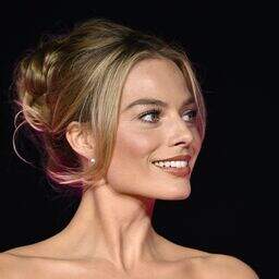 Actress Margot Robbie's impressively taut neckline. Photo: Gareth Cattermole/Getty