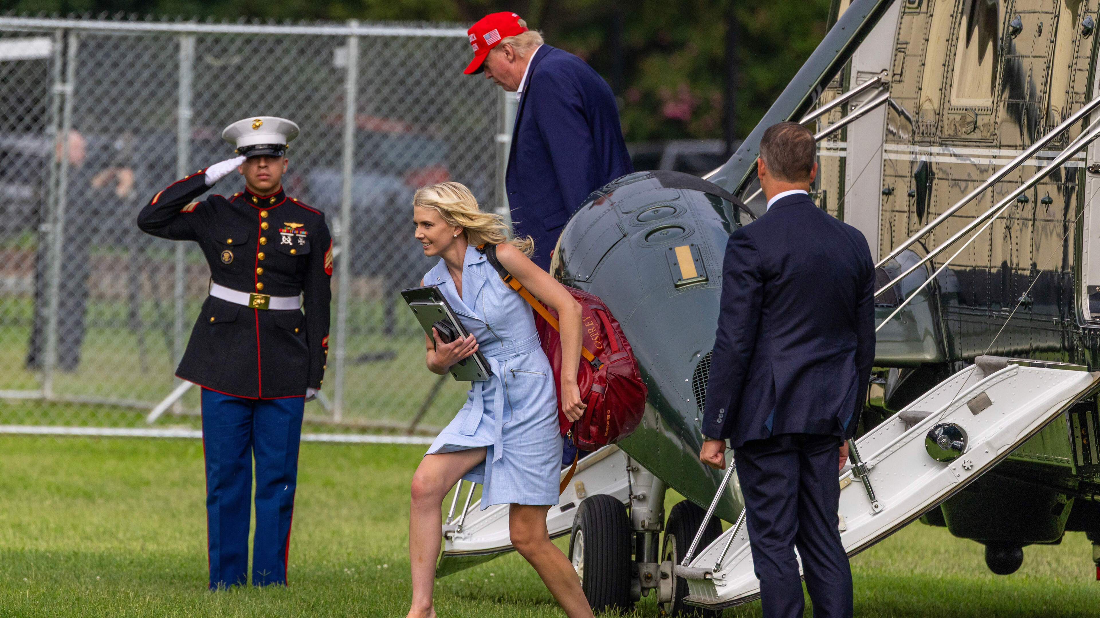 Trump aide Natalie Harp climbed into boot of SUV when she couldn’t get a seat in his motorcade, according to report
