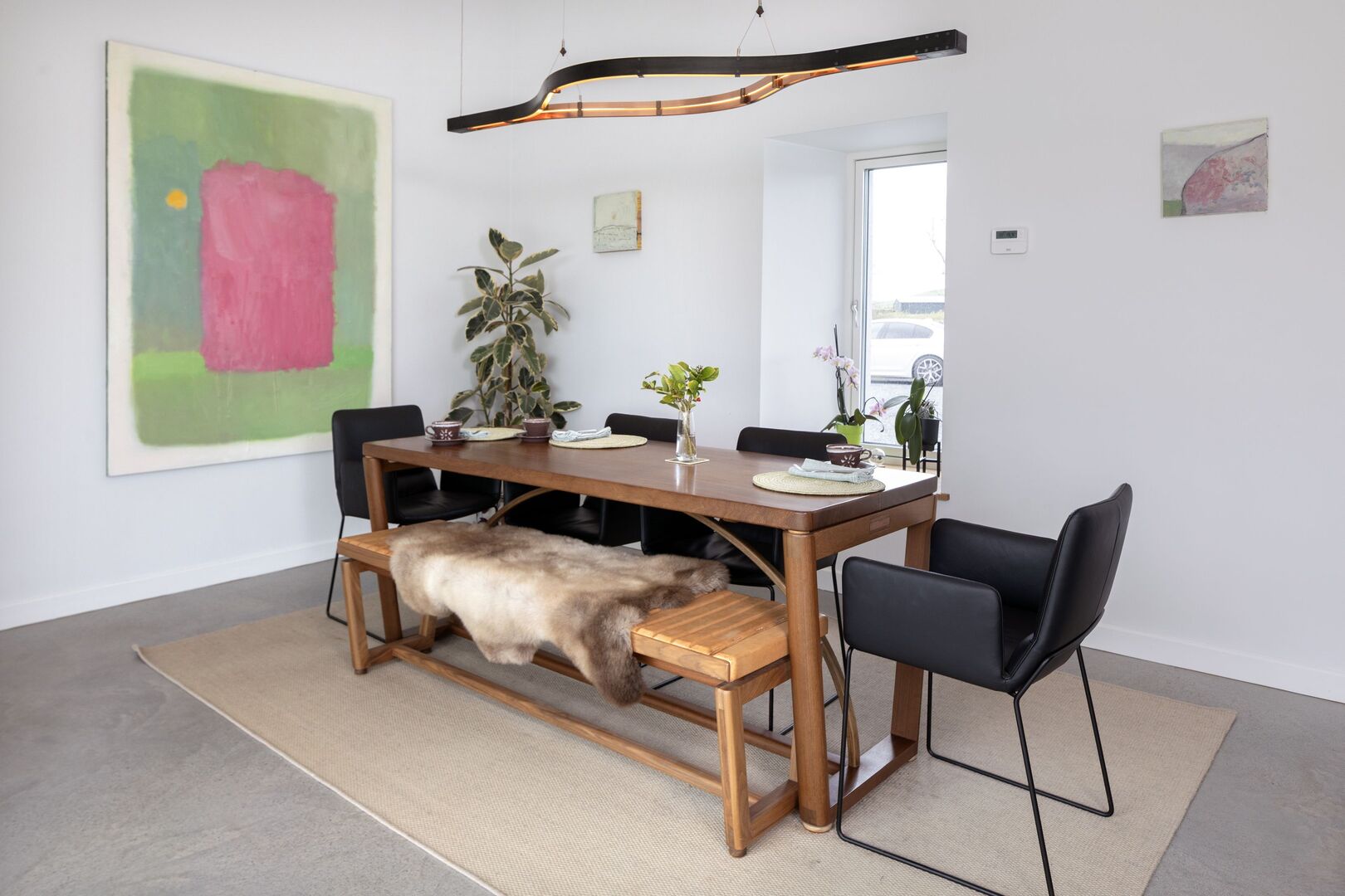 The dining table, bench and the light overhead were all designed by Gildas O Laoire. Photo: Tony Gavin