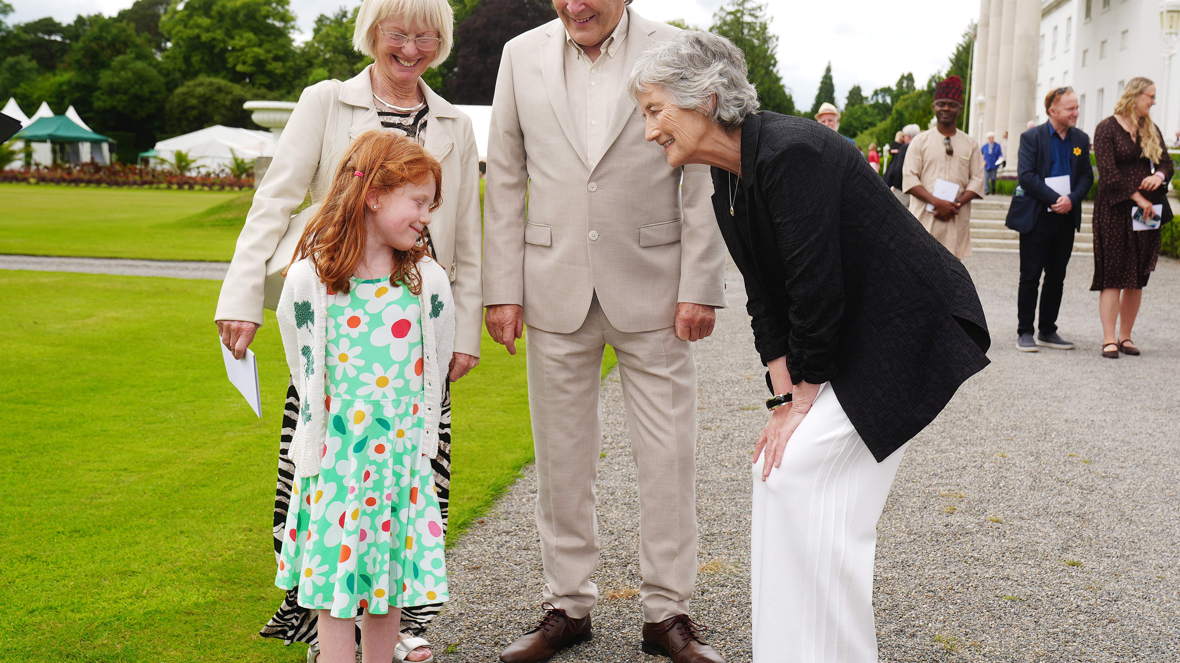 Cowboy hats and summer dresses at Irish president’s first garden party