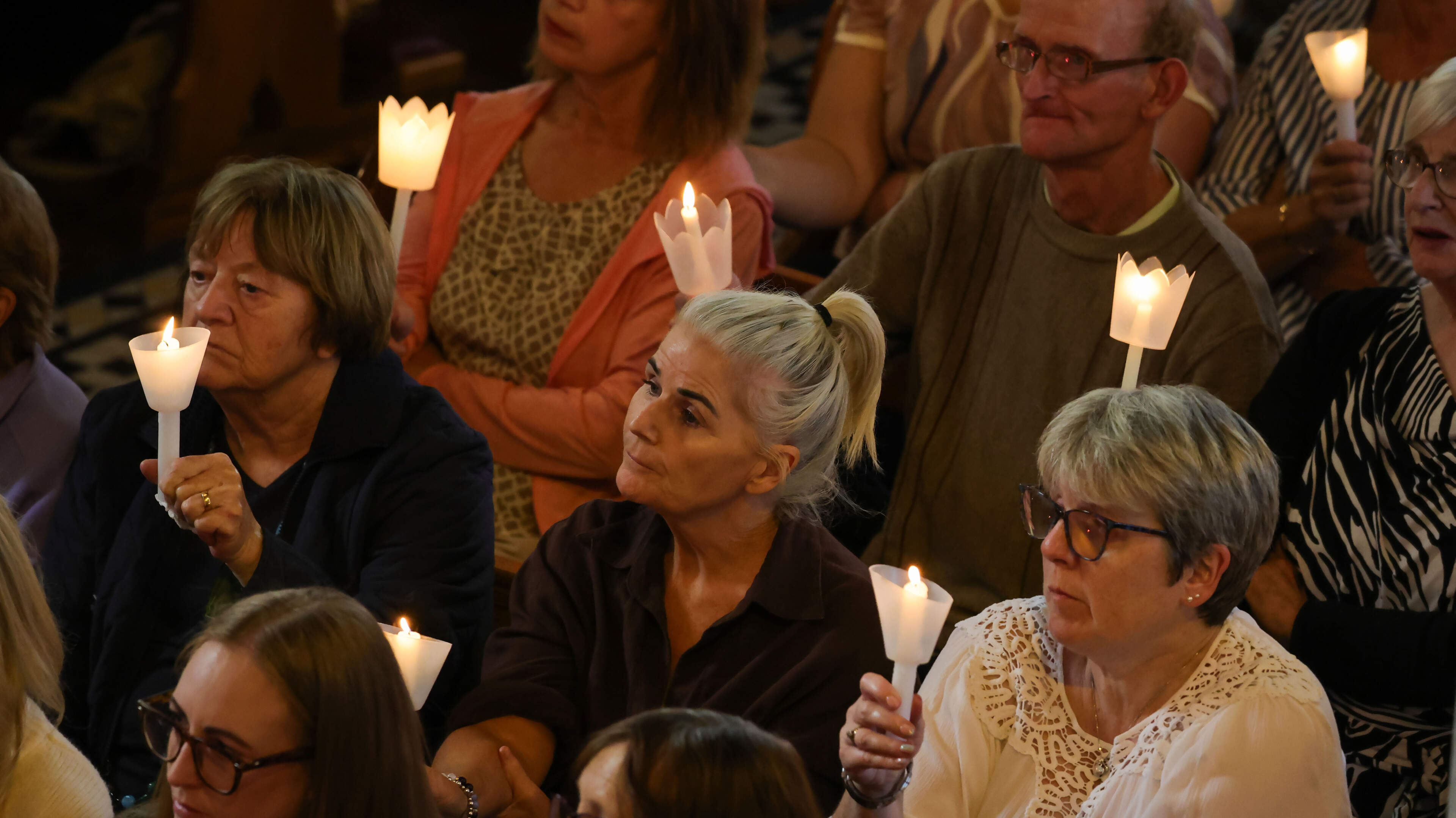 Community rallies around survivors of M9 horror crash as hundreds turn out for vigil