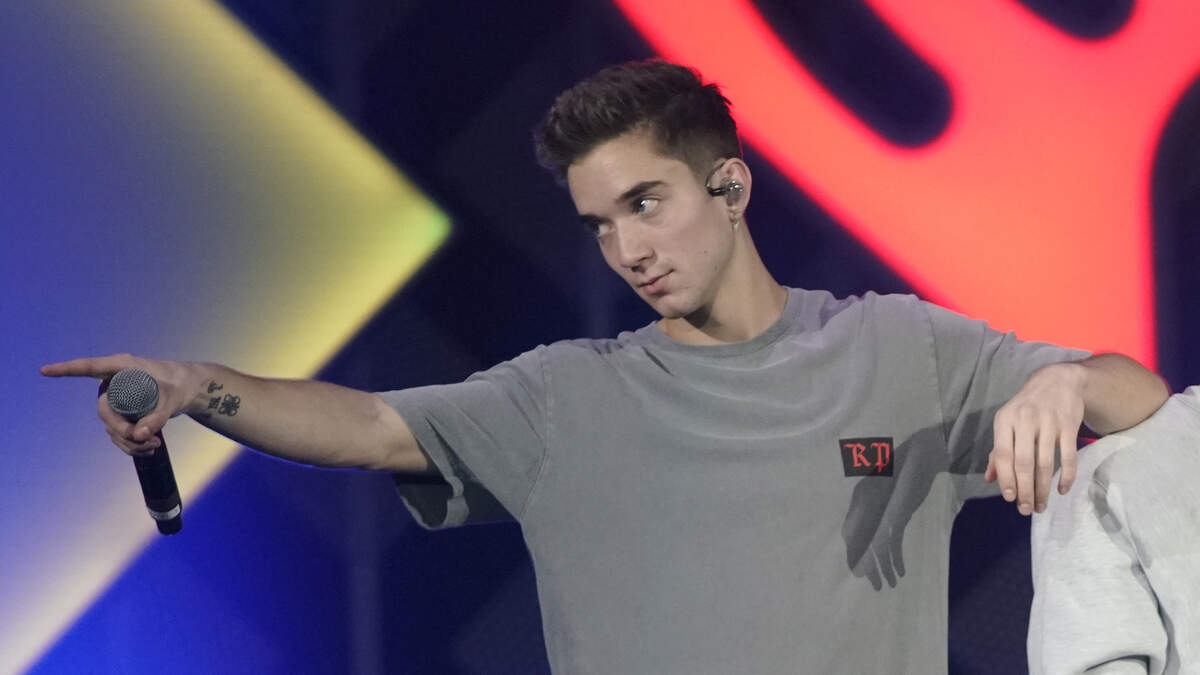Ex-girlfriend of boyband member charged with trying to hire a hitman to kill him