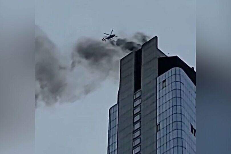 Heavy smoke and flames near World Trade Centre amid high-rise rooftop ...