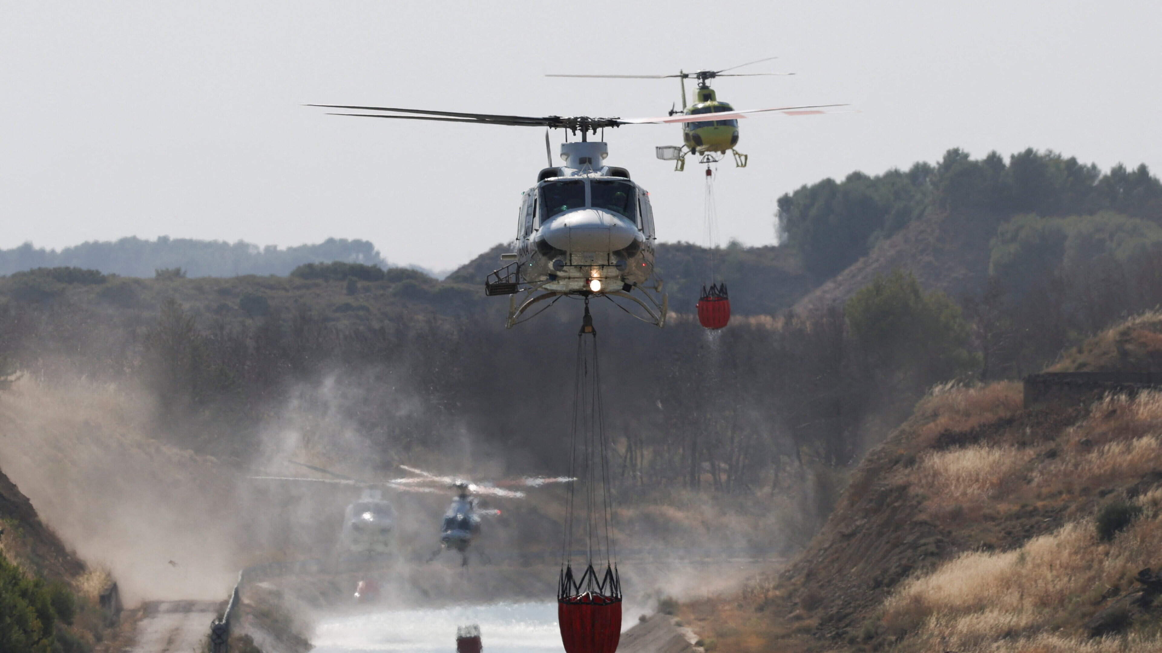 Firefighters struggle to contain huge blaze in north-east Spain