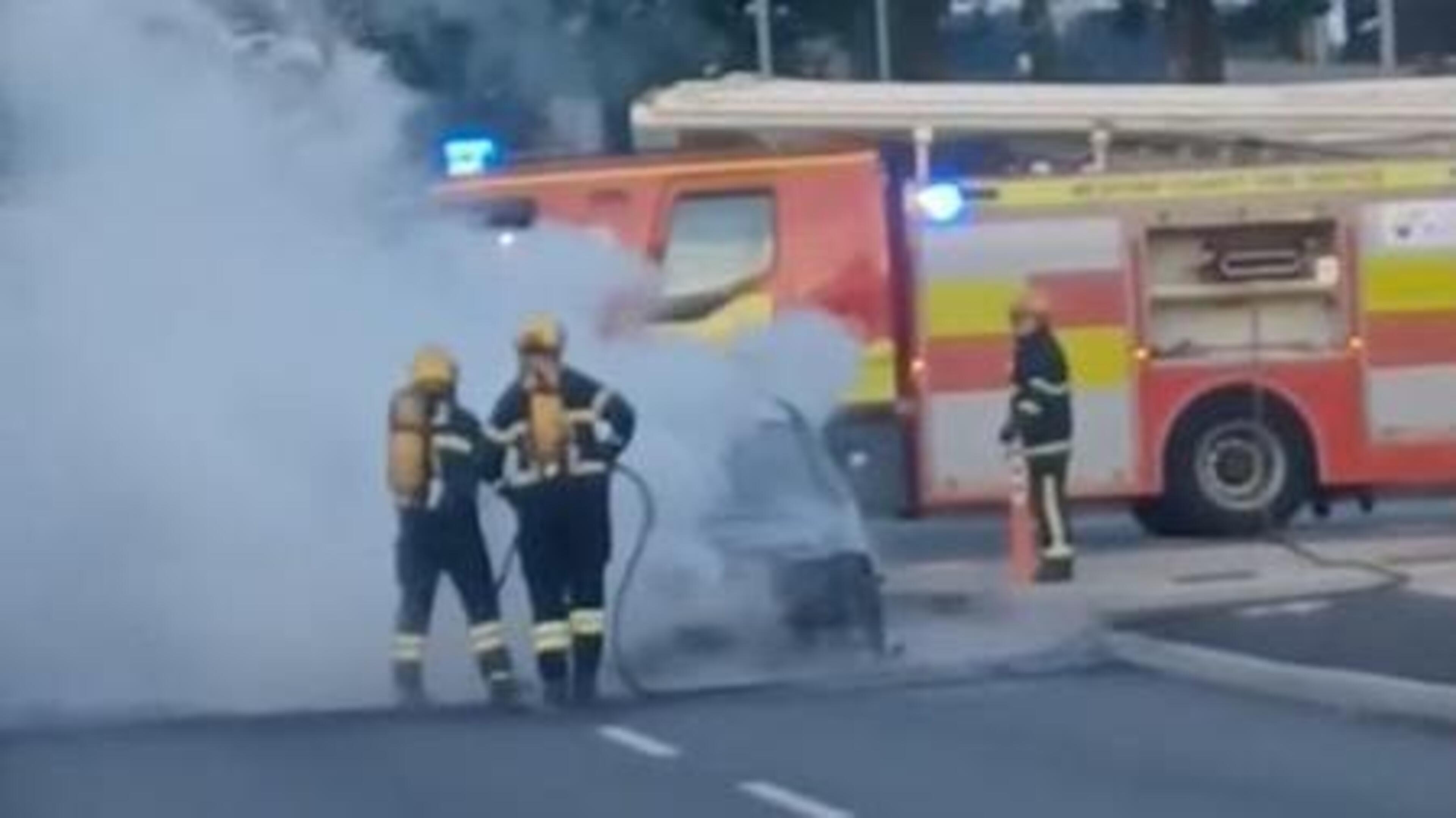 Driver's miraculous escape as car bursts into flames outside