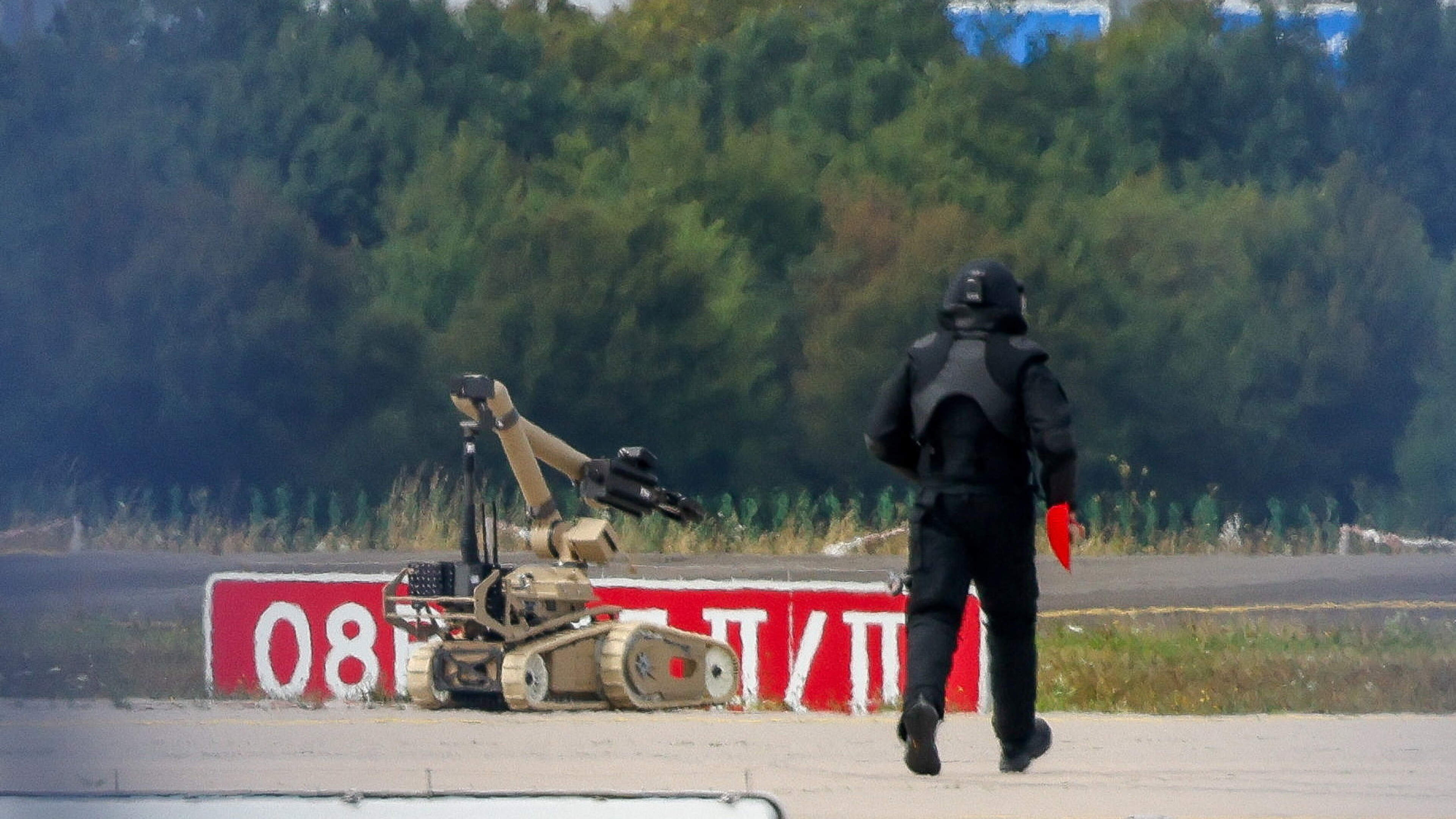 Bus driver kicked explosive drone out of the air at German airport, lawmaker says