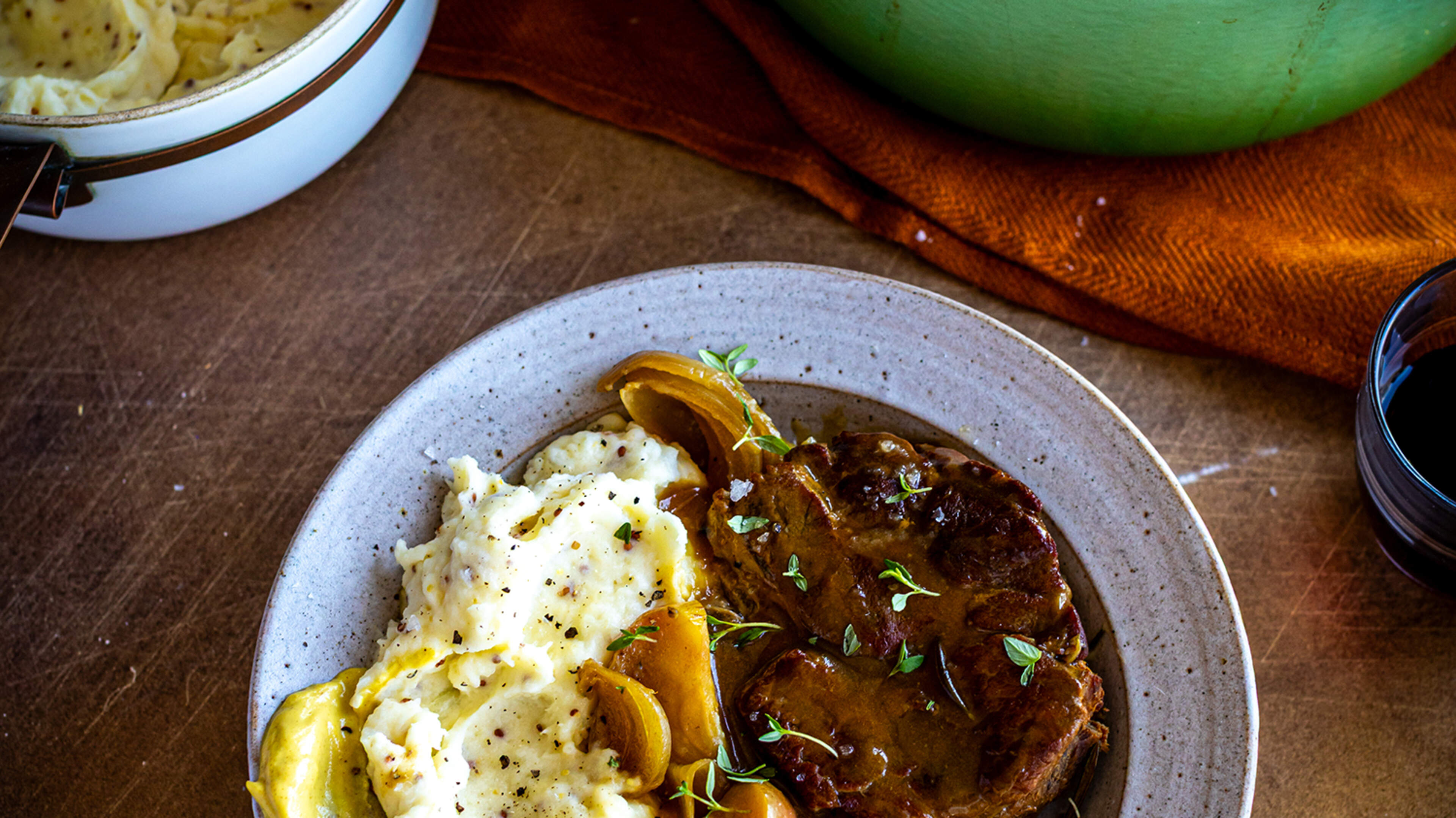 Cider-braised pork shoulder with apples & mustard mash