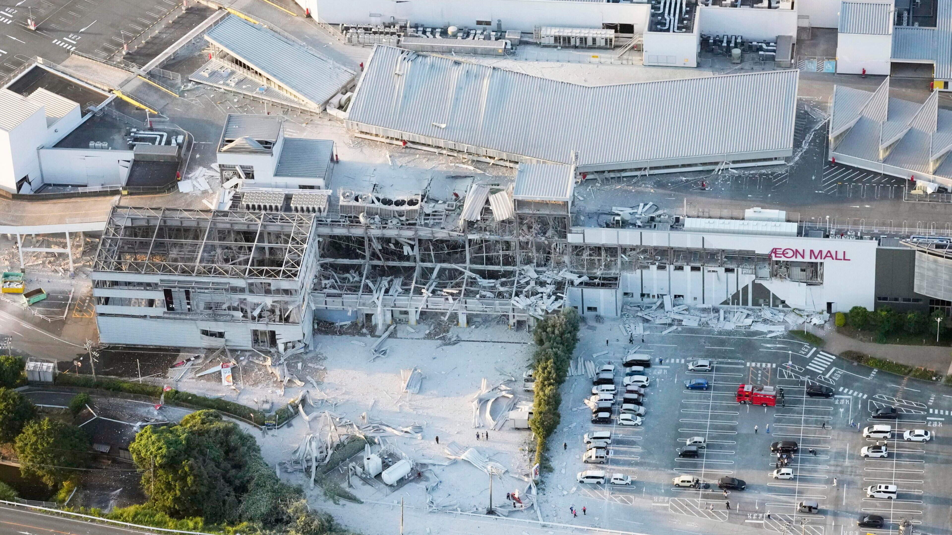 Rescuers in Japan haul survivors from collapsed mall as earthquake toll rises to 13