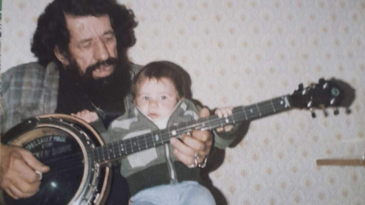 Son of Irish music legend launches appeal to be reunited with stolen banjo gifted to his father by U2