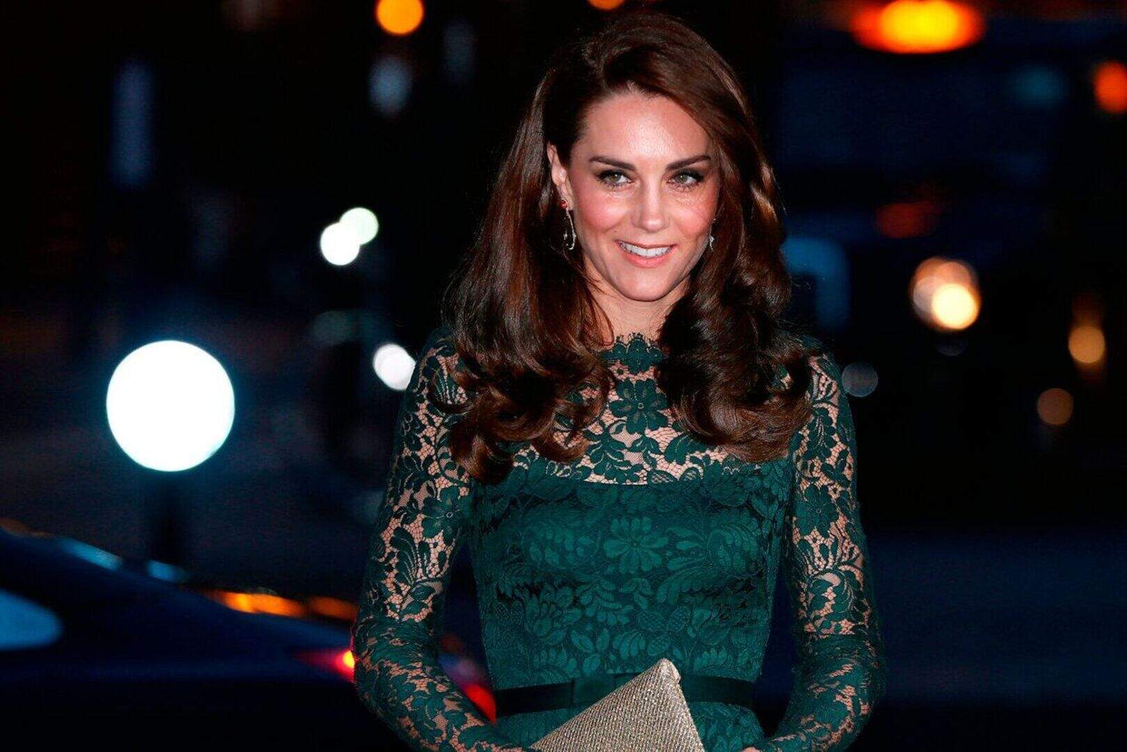 kate middleton green lace dress looks elegant in emerald as she talks about Prince George signing up to 'big school' antique gold sequin dress