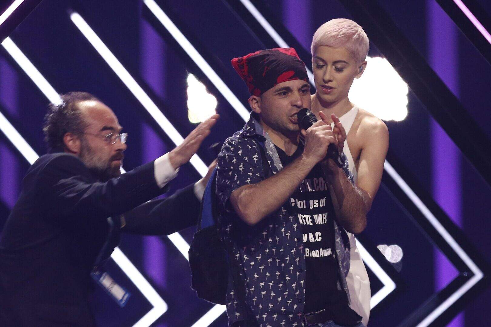Stage invader snatches microphone during UK’s Eurovision performance ...