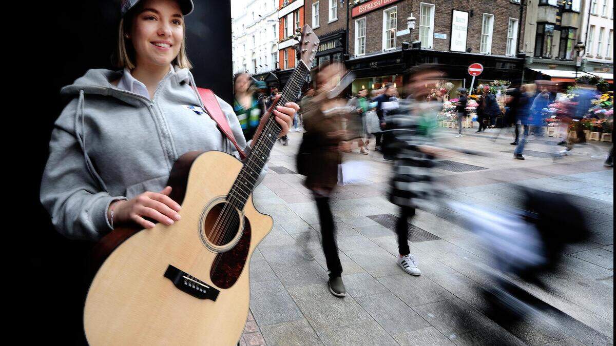 Major record labels queuing up to sign Irish teenage busker Allie ...