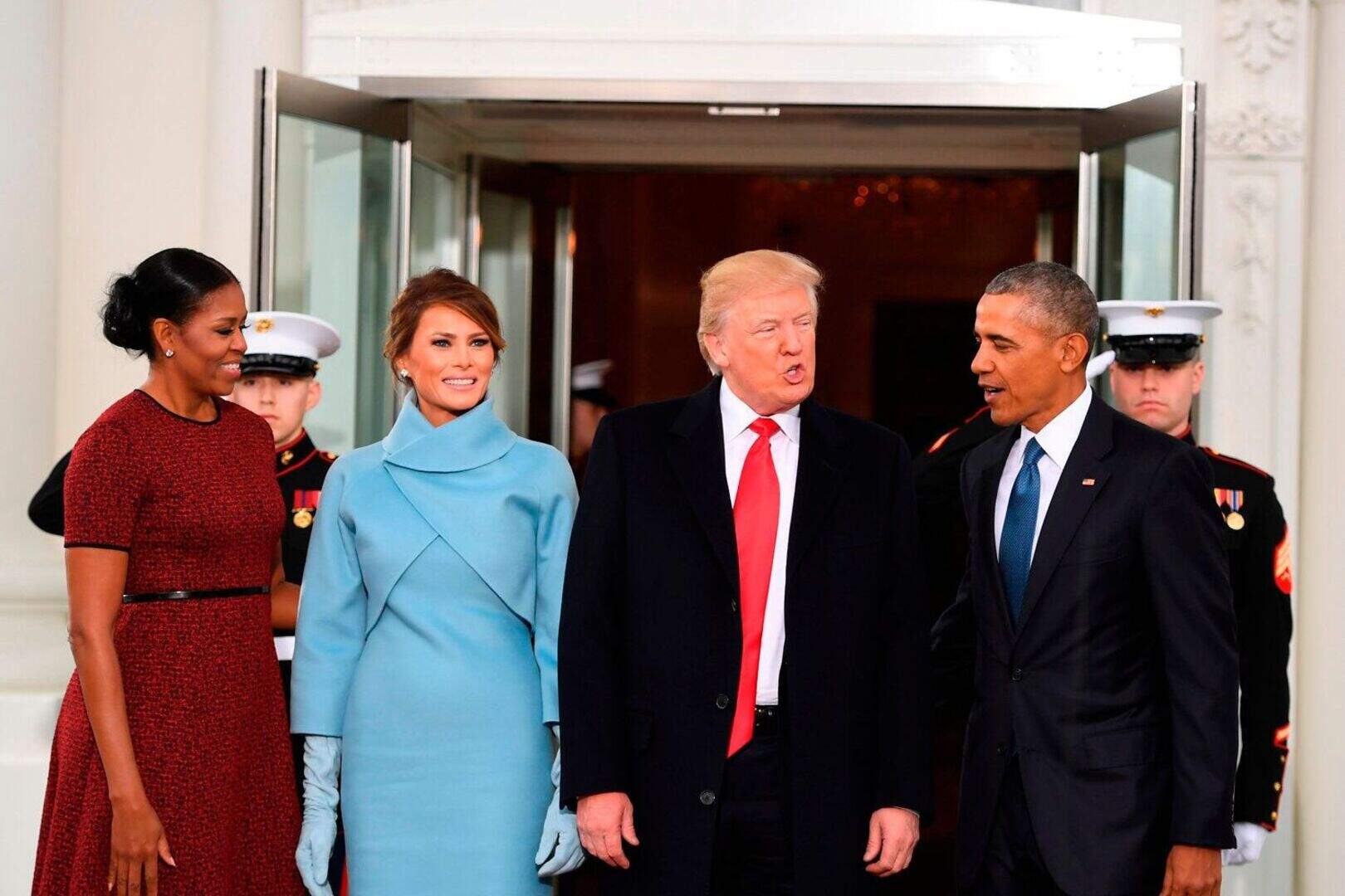 Melania Trump opts for sky blue Ralph Lauren dress for Inauguration Day as  she greets Obamas at White House | Irish Independent