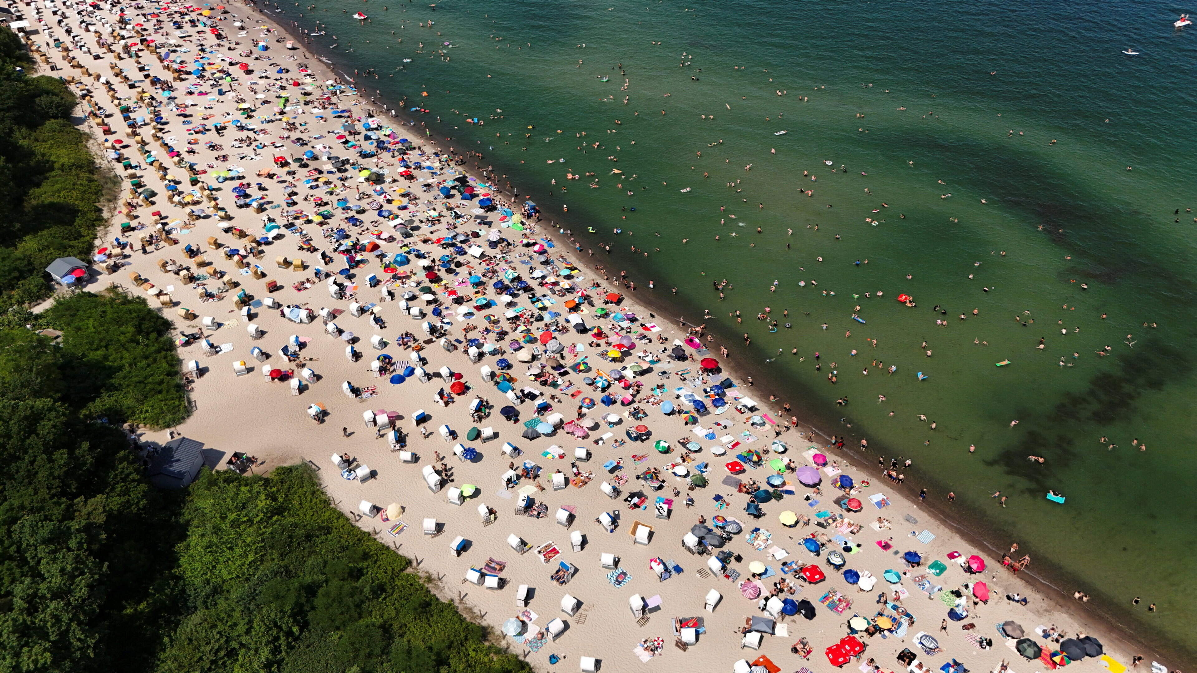 Germany and Denmark gripped by record temperatures as European heatwave moves east