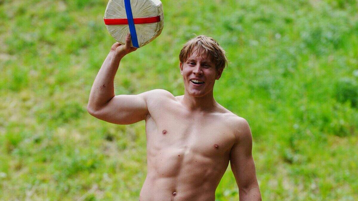 German YouTuber pips local man to win Gloucestershire cheese-rolling contest