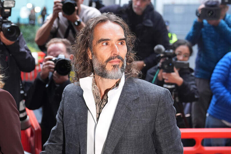 Russell Brand arrives at Southwark Crown Court, London, where he faces three charges of rape, indecent assault, and three counts of sexual assault, relating to six women. Picture date: Monday October 12, 2026.
