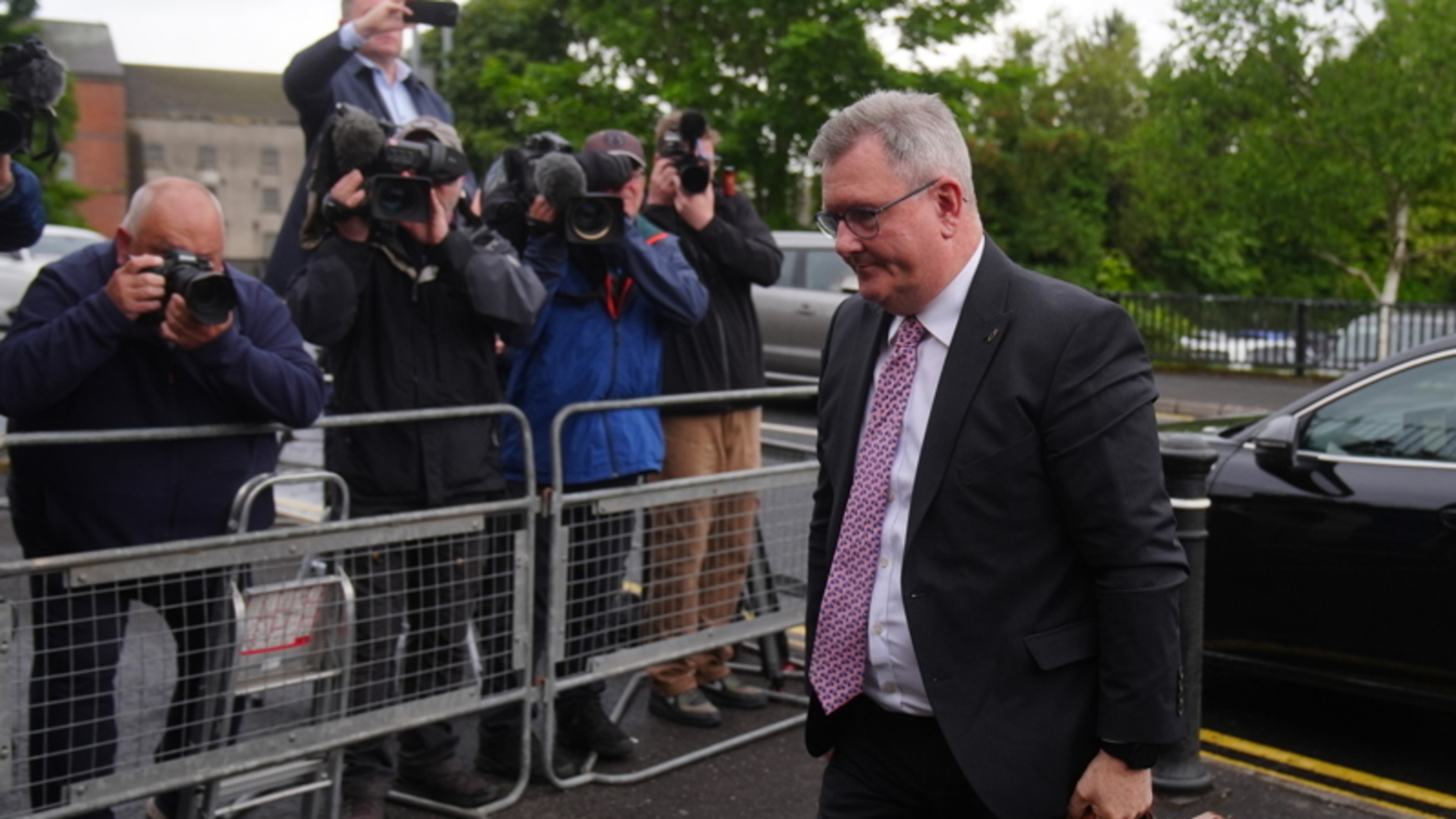 Jeffrey Donaldson arrives at court as trial over alleged historical sexual offences continues