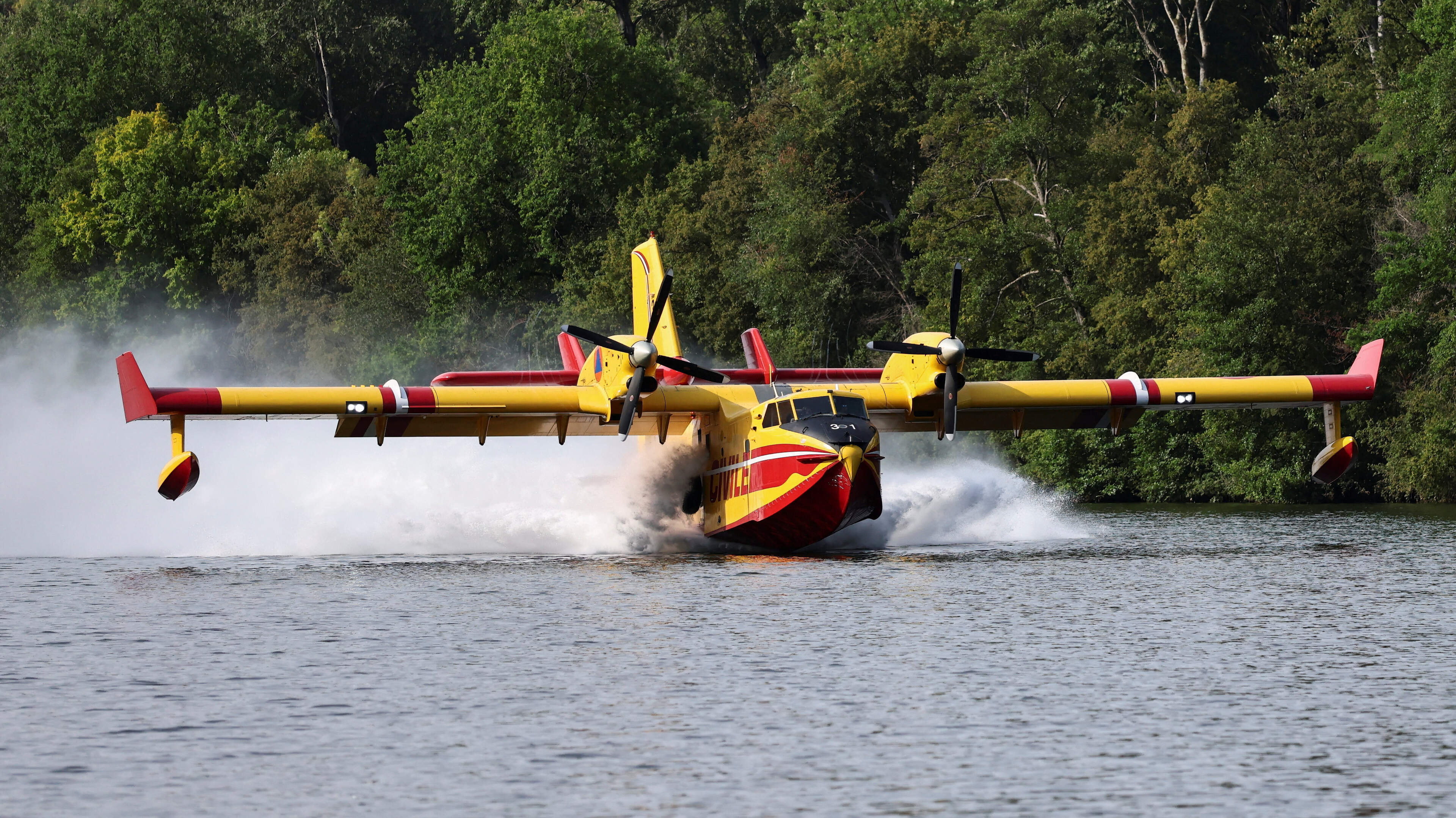 Firefighting aircraft battle forest blaze near Paris as Europe swelters under heatwave