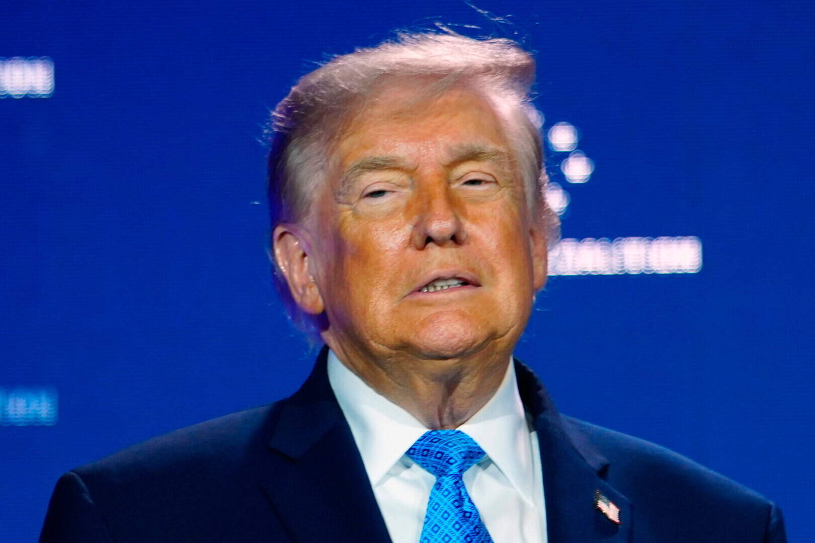 Trump threatens 100% tariff on UK over digital services tax targeting US tech firms; warns of immediate action.