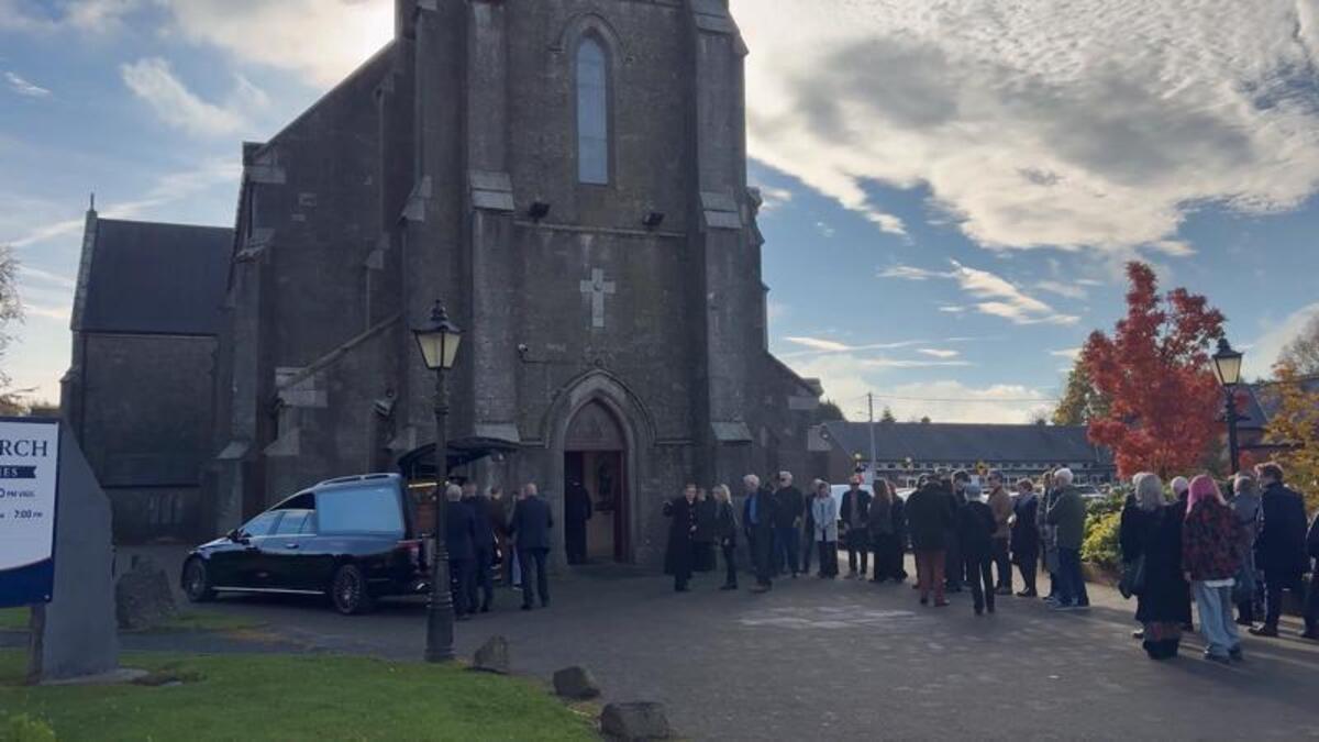 Mourners attend the funeral of Irish traditional musician Donal Lunny