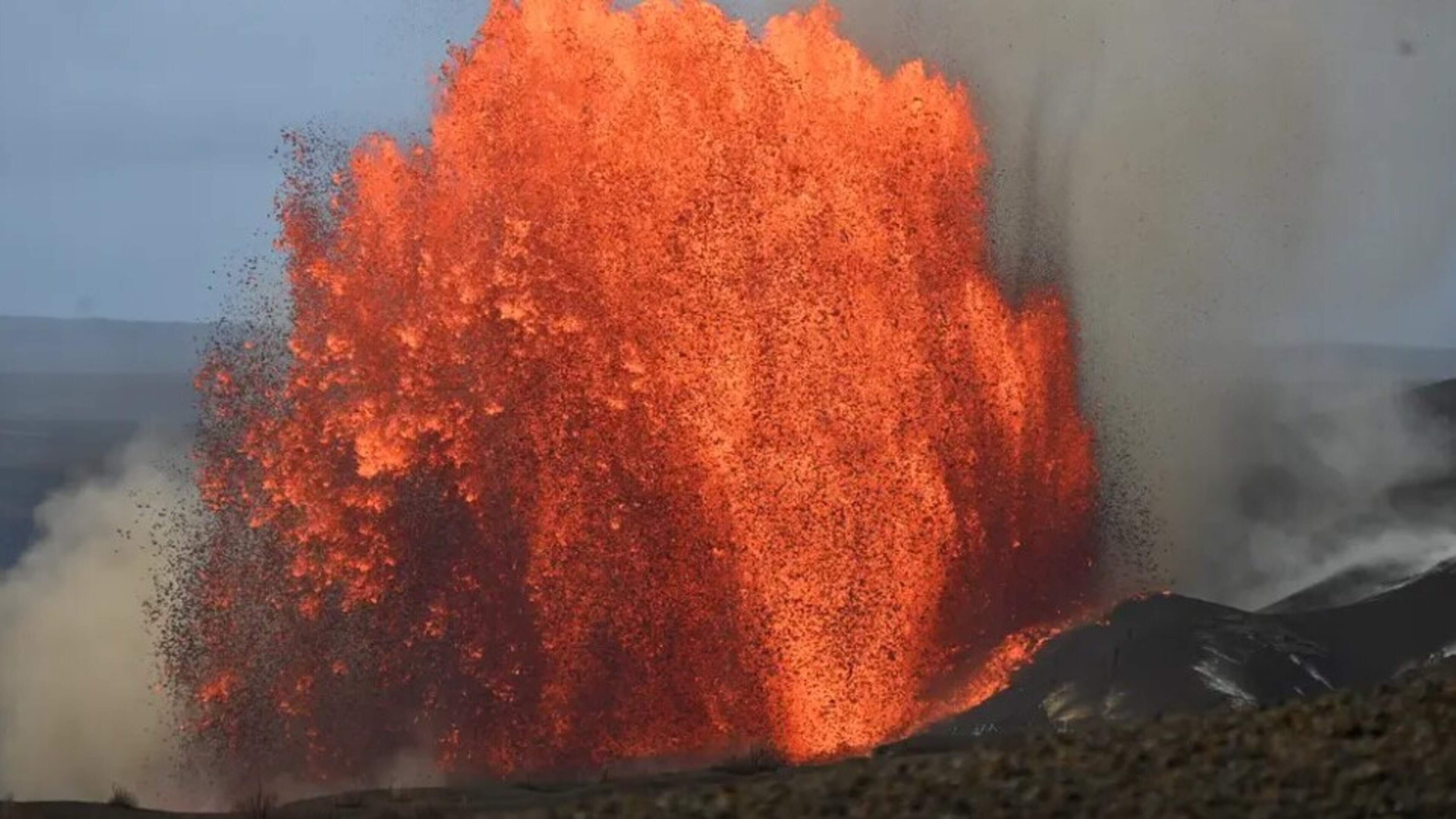 Tourists watch latest eruption as Hawaii’s Kilauea volcano sets lava record