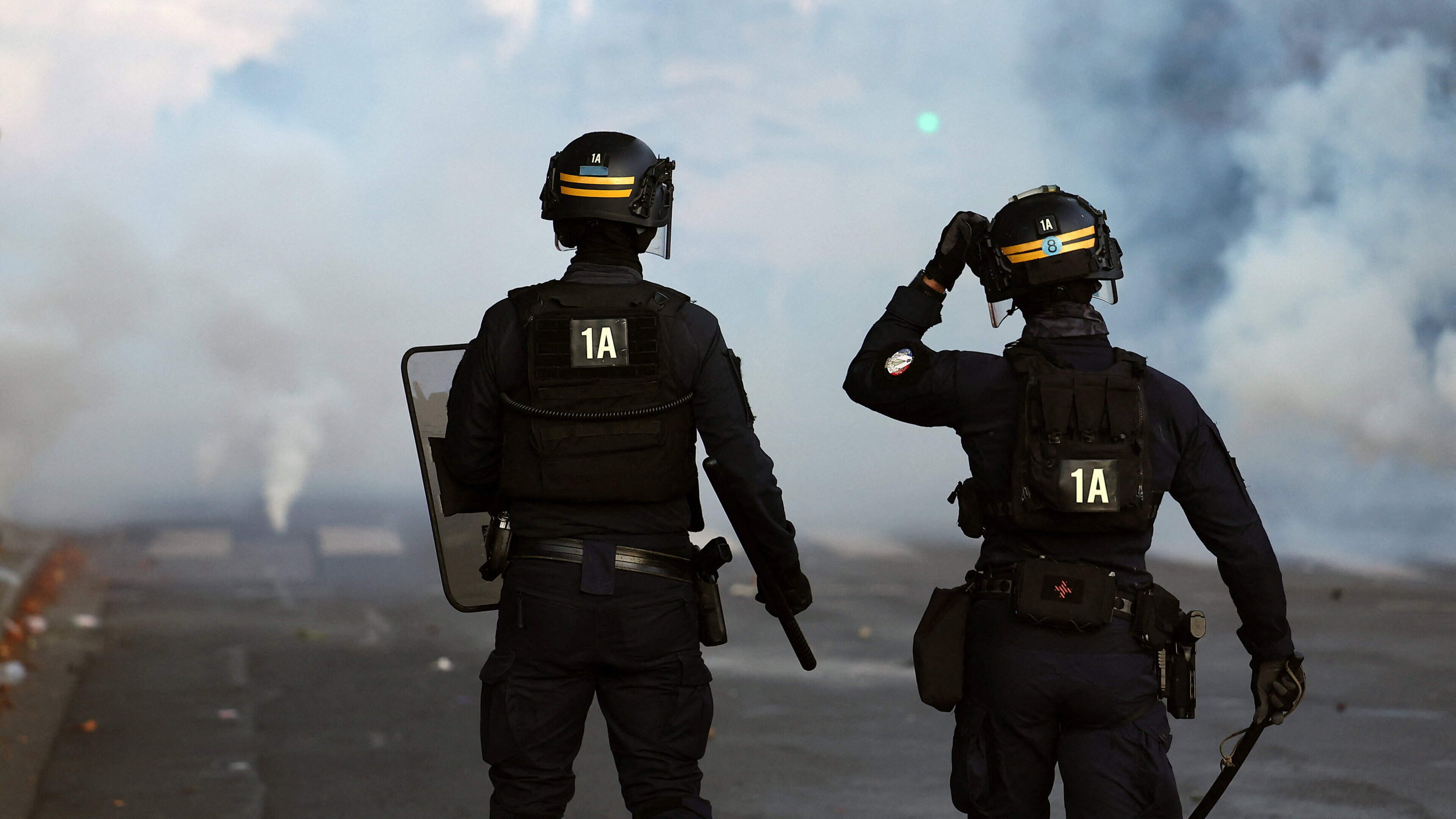 Police fire tear gas at French protesters on biggest day of school demonstrations