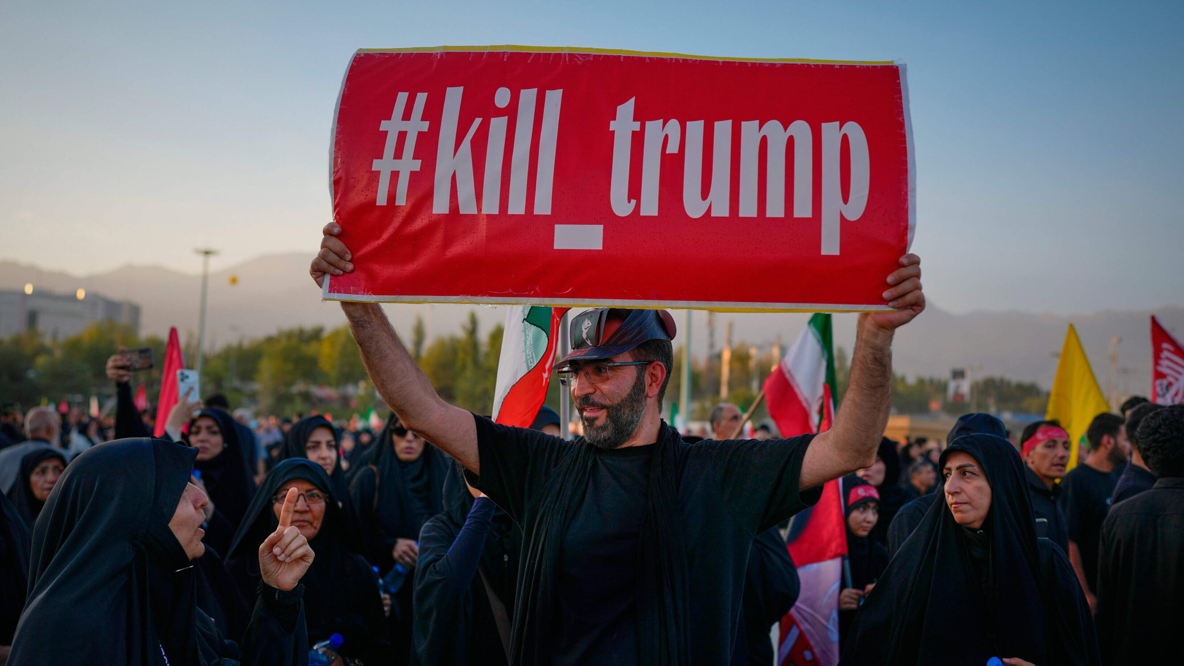Mourners at Khamenei funeral carry signs that read: ‘Kill Trump’  