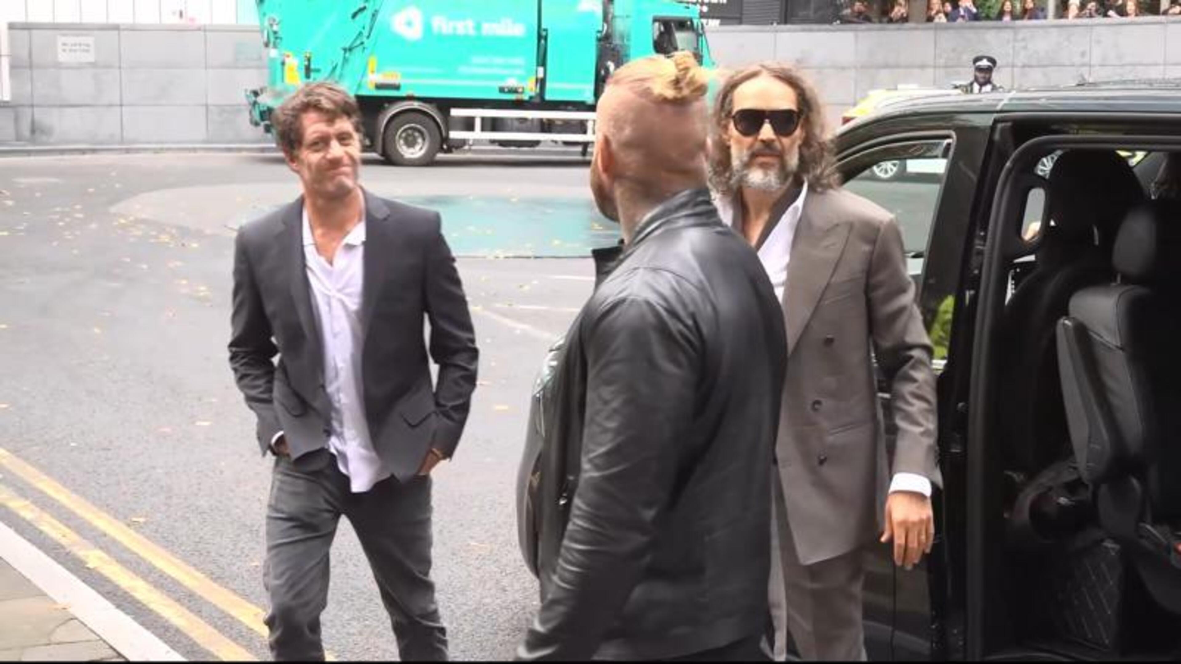 Russell Brand says ‘blessed’ as he arrives at UK court for second day of rape trial