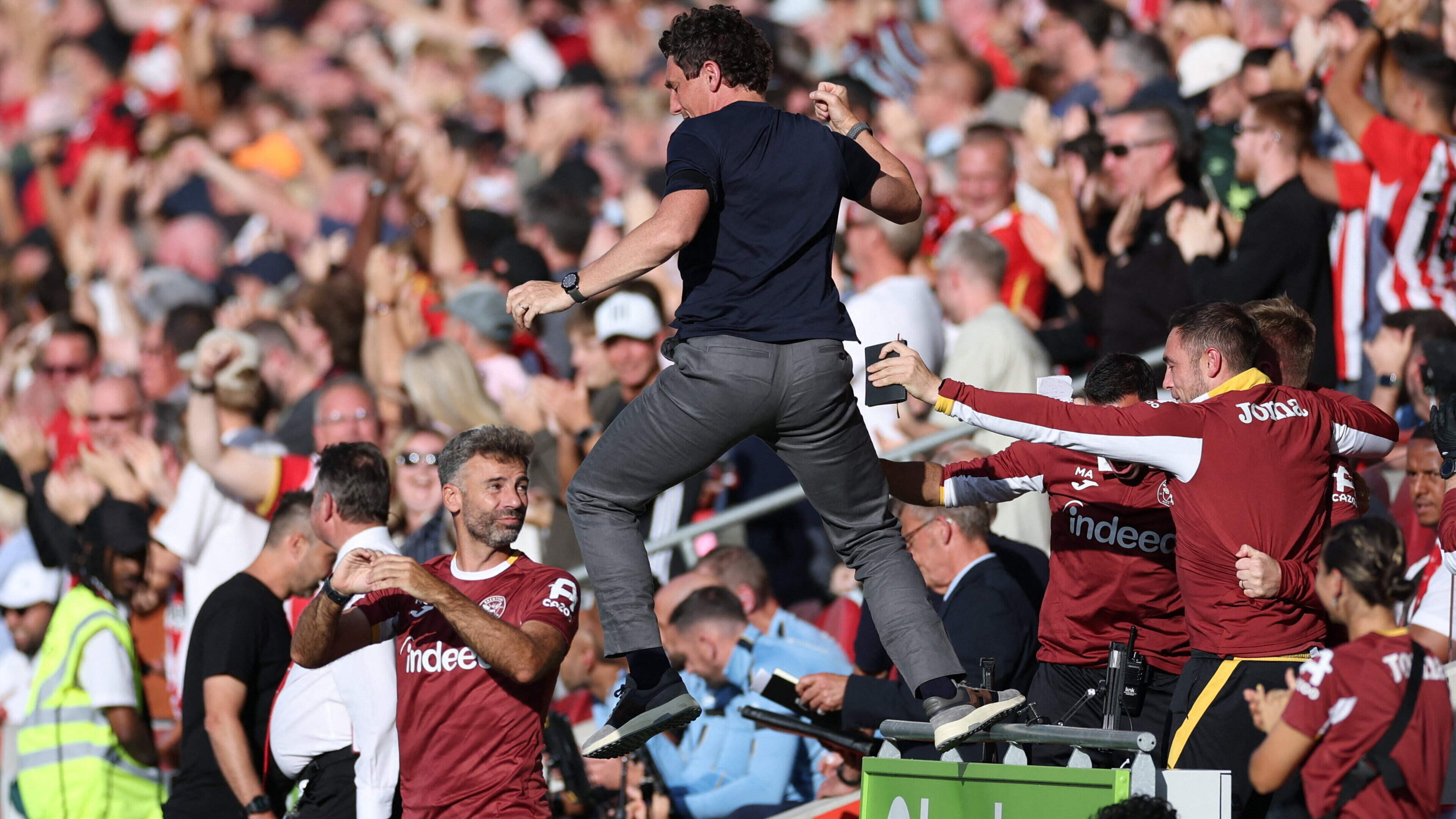 Keith Andrews jumps for joy as his Brentford side hammer Tottenham in one-sided Premier League opener