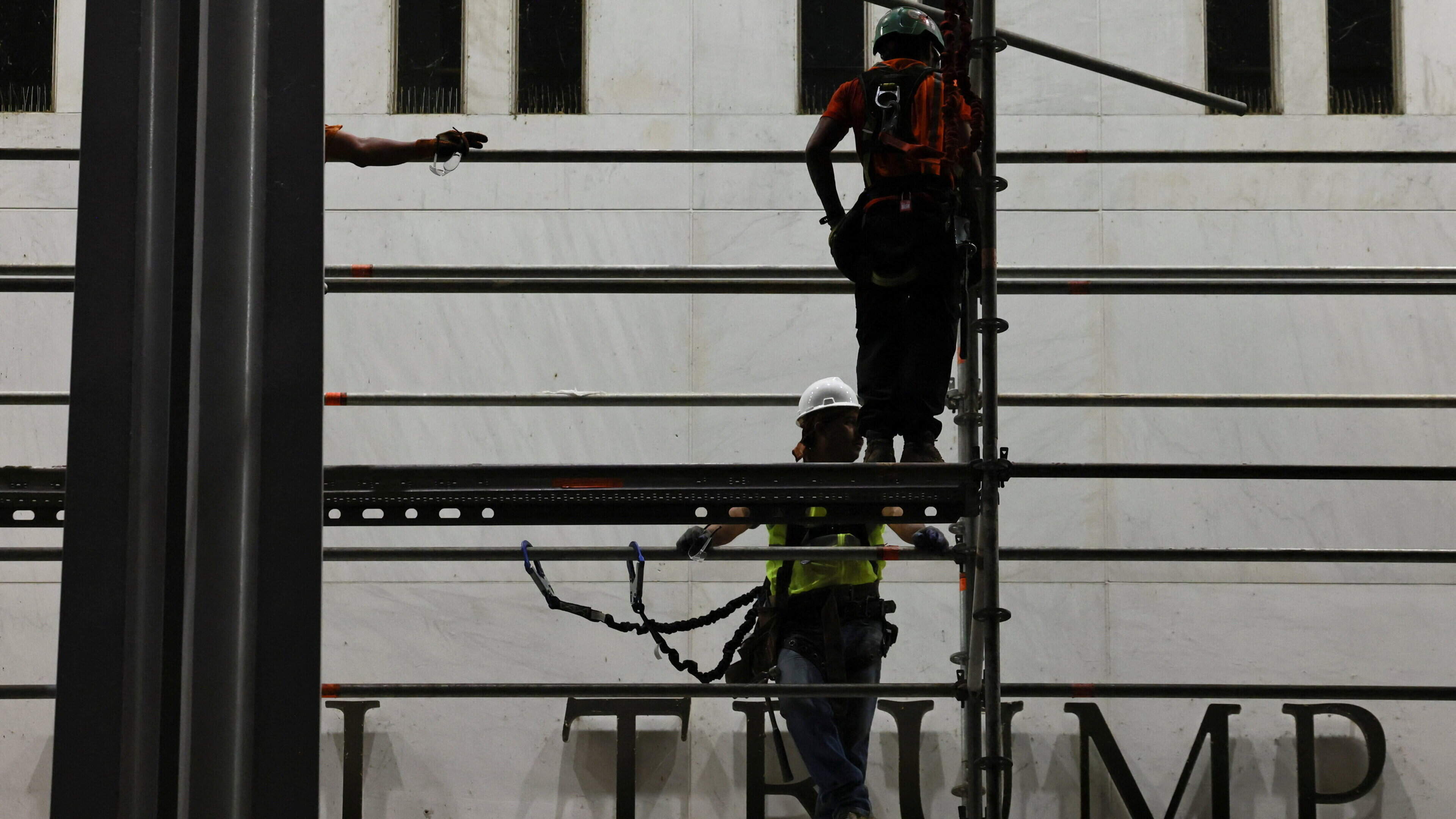 Construction crew strips Donald Trump’s name from Kennedy Center after president loses another legal battle