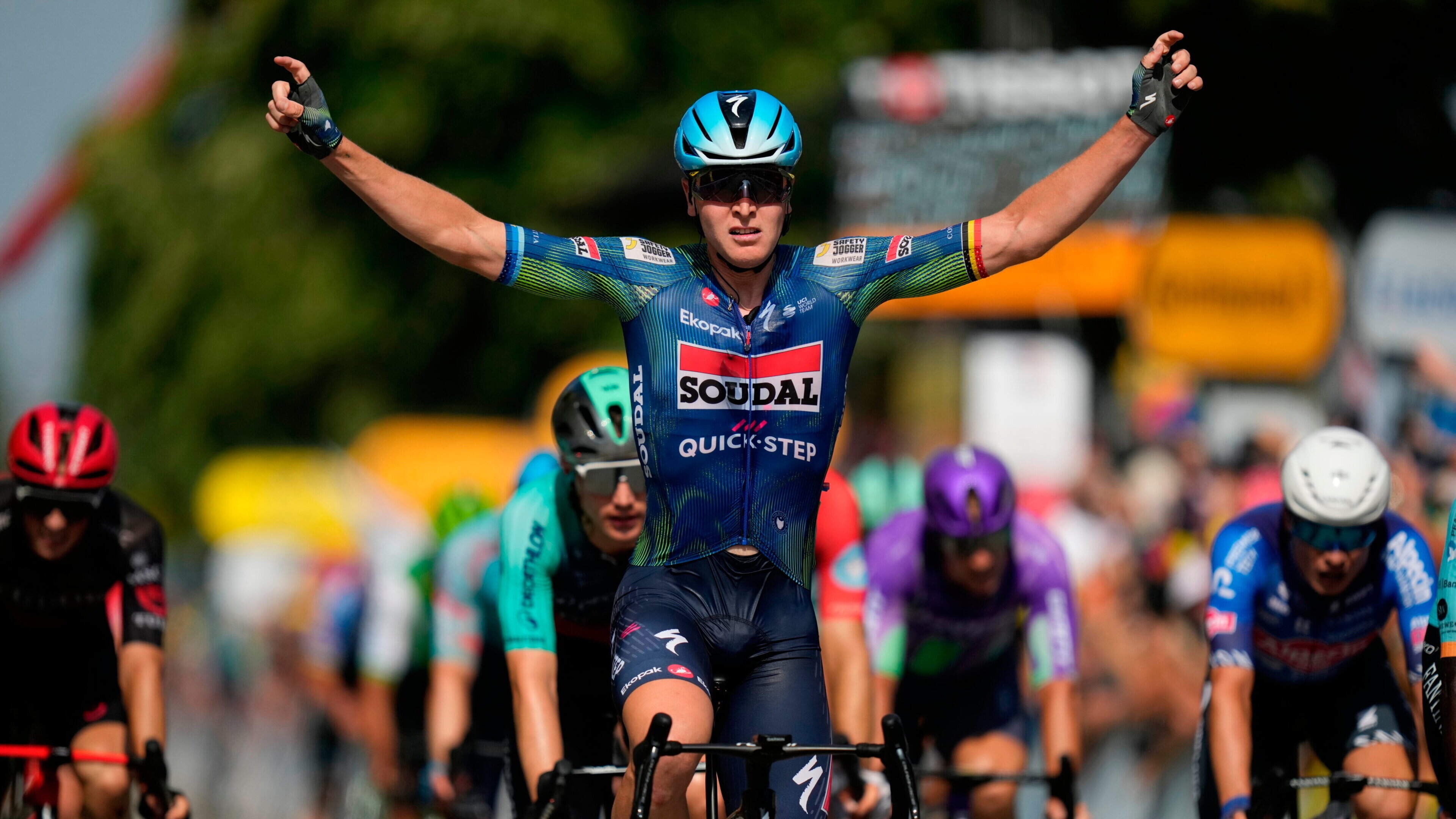 Tim Merlier doubles up to win stage eight of Tour de France in sprint finish