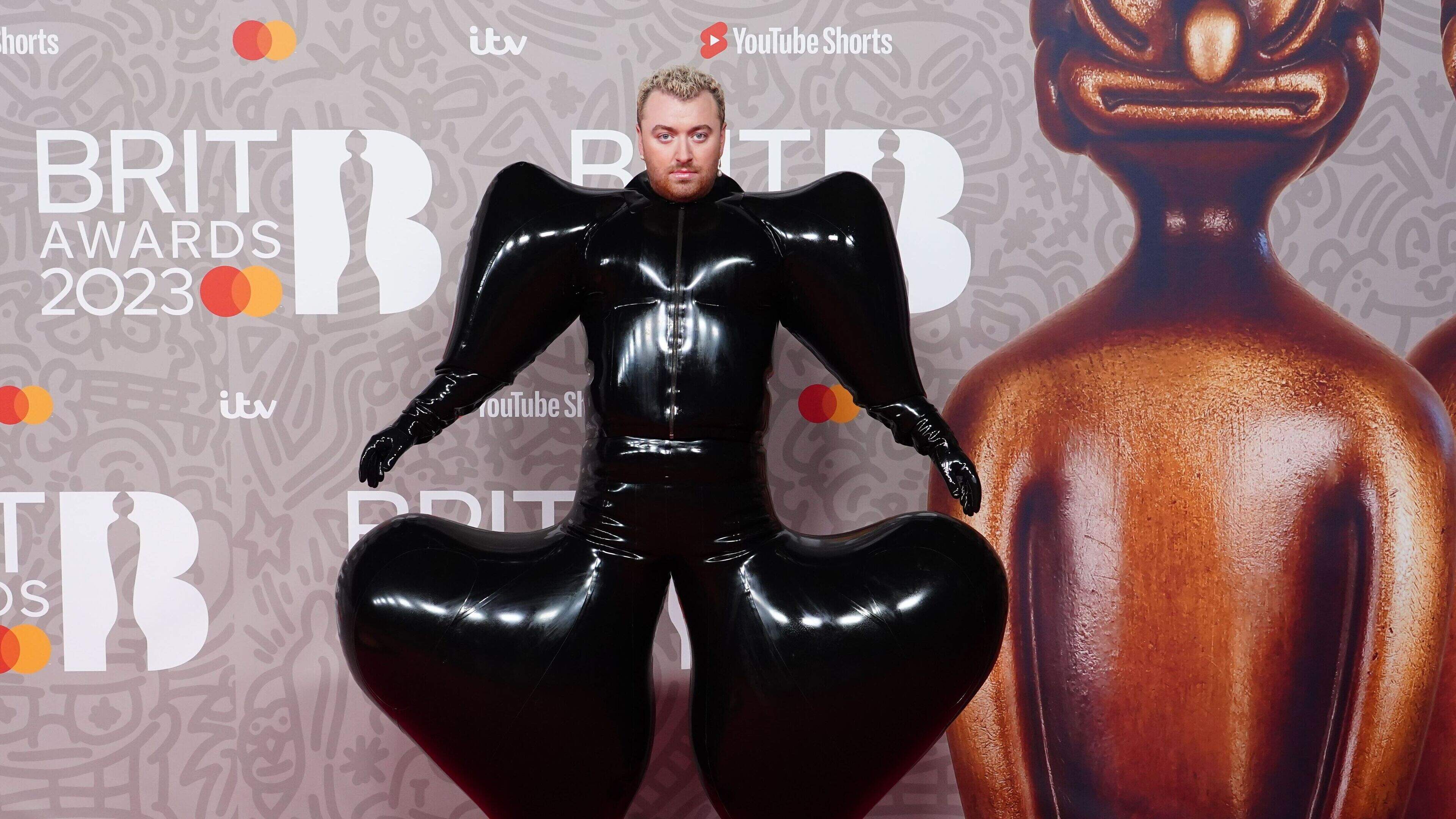 Sam Smith dons latex bodysuit for Brits red carpet dominated by black  outfits | Irish Independent