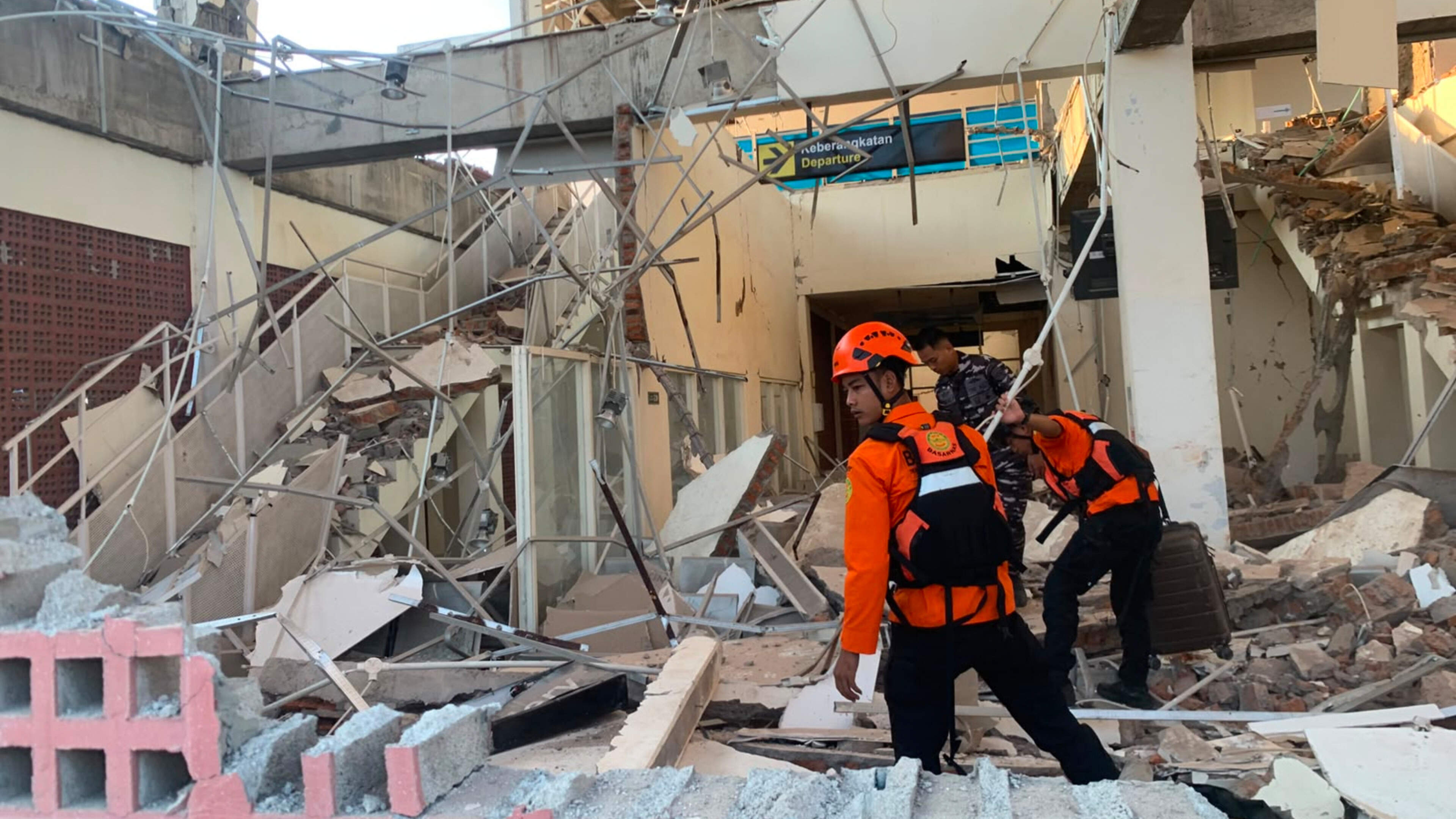 Twenty dead after 7.7 earthquake hits Indonesia
