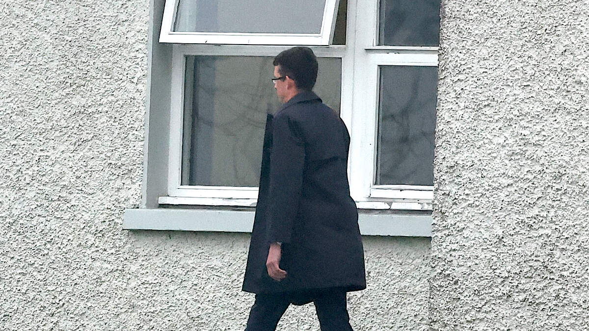 Enoch Burke returns to school he was sacked from despite threat of prison for contempt