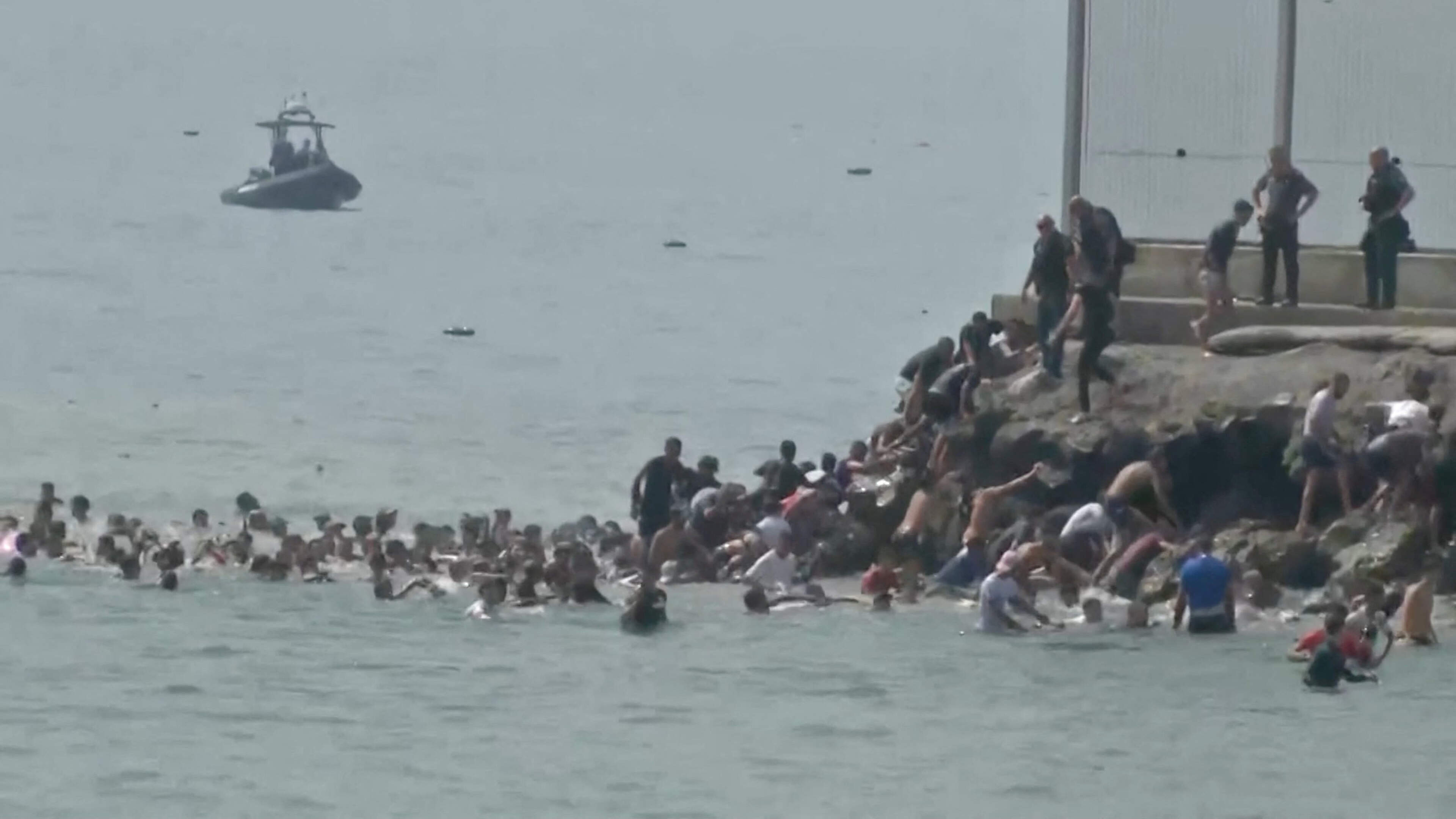 Spanish government sends army units to Ceuta as migrants break through Moroccan border
