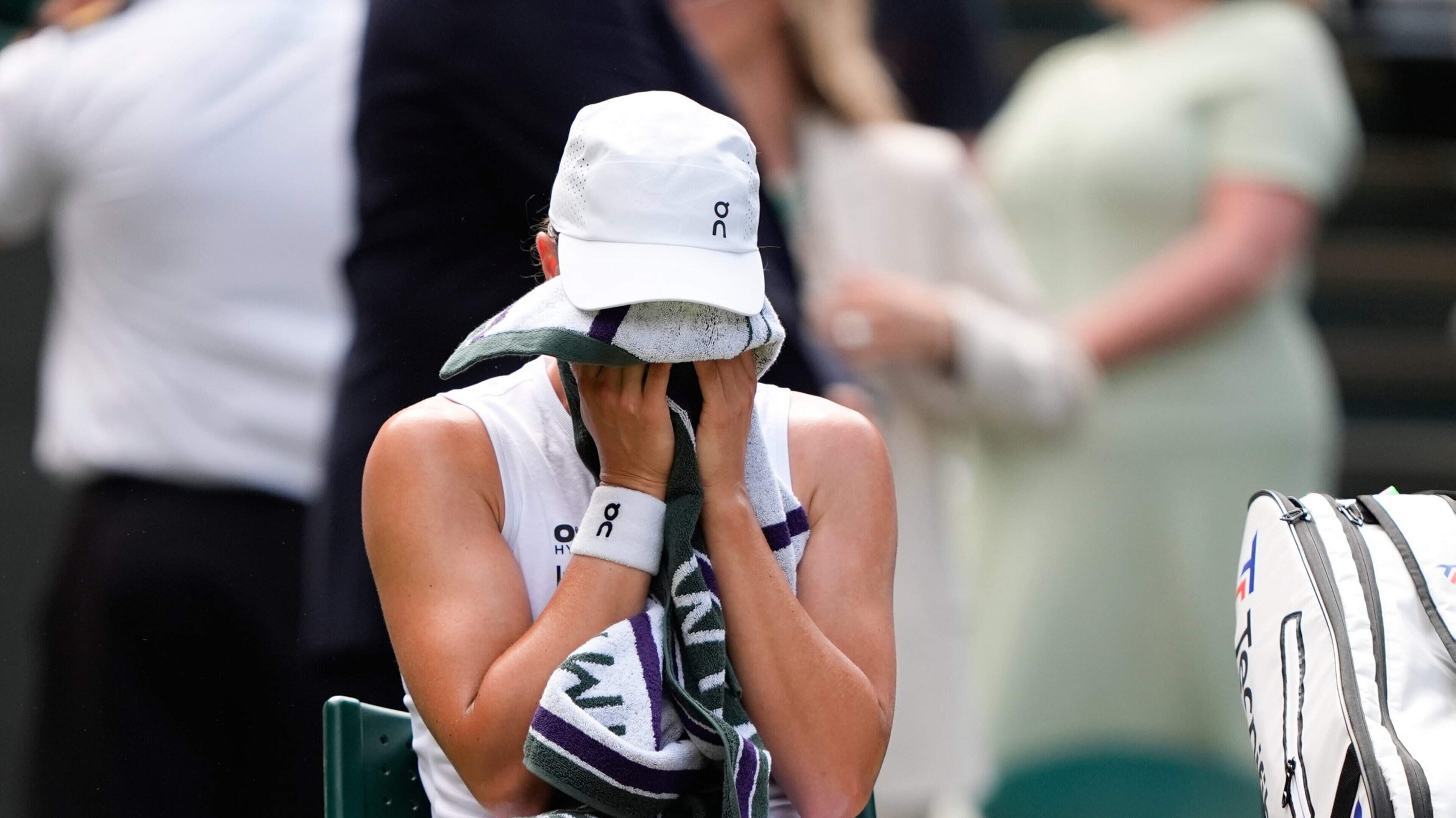 Iga Swiatek breaks down in tears after surviving scare at start of title defence