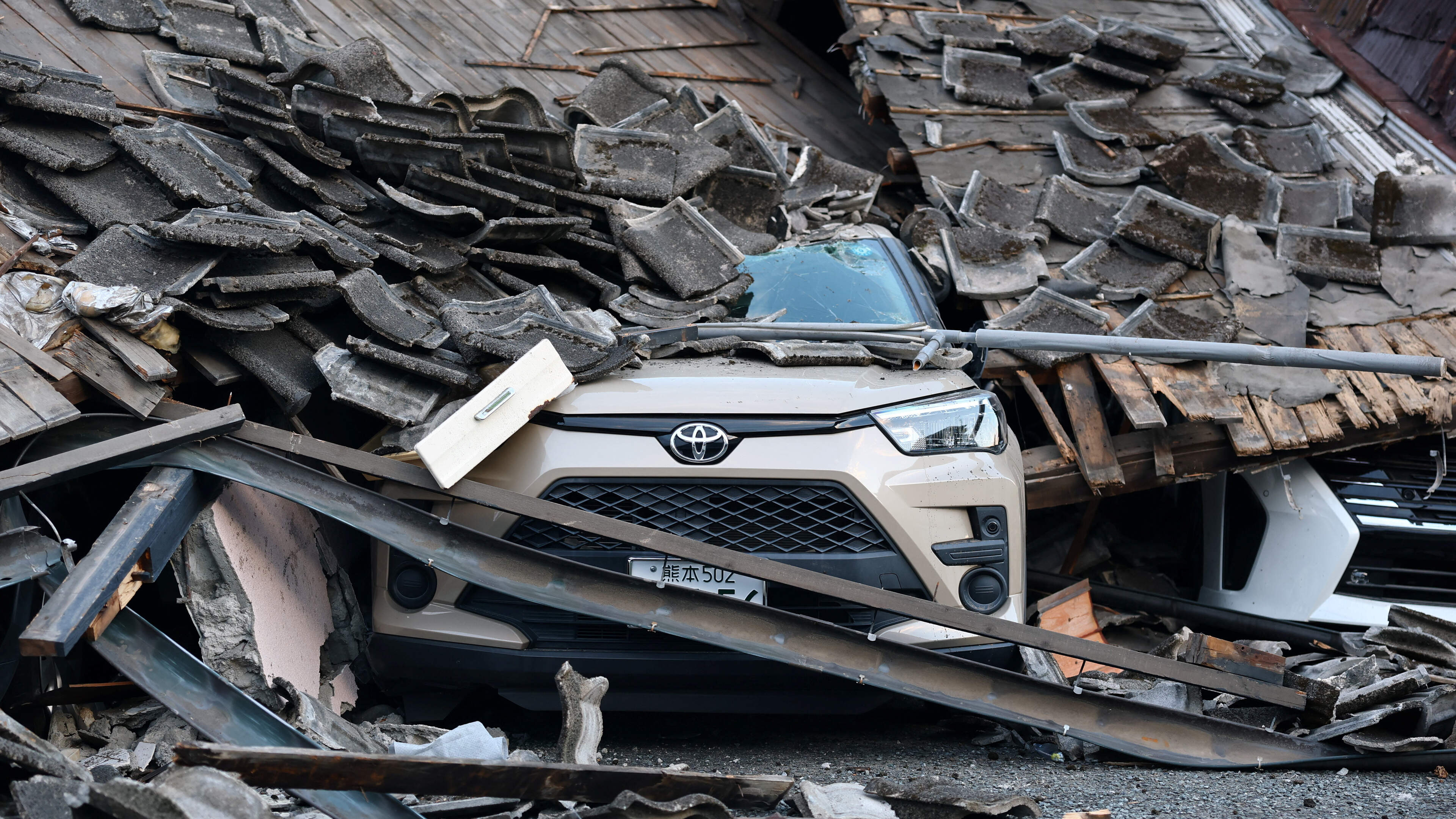 ‘I thought a bomb had gone off’: Japan races to find survivors as earthquake death toll climbs to 18