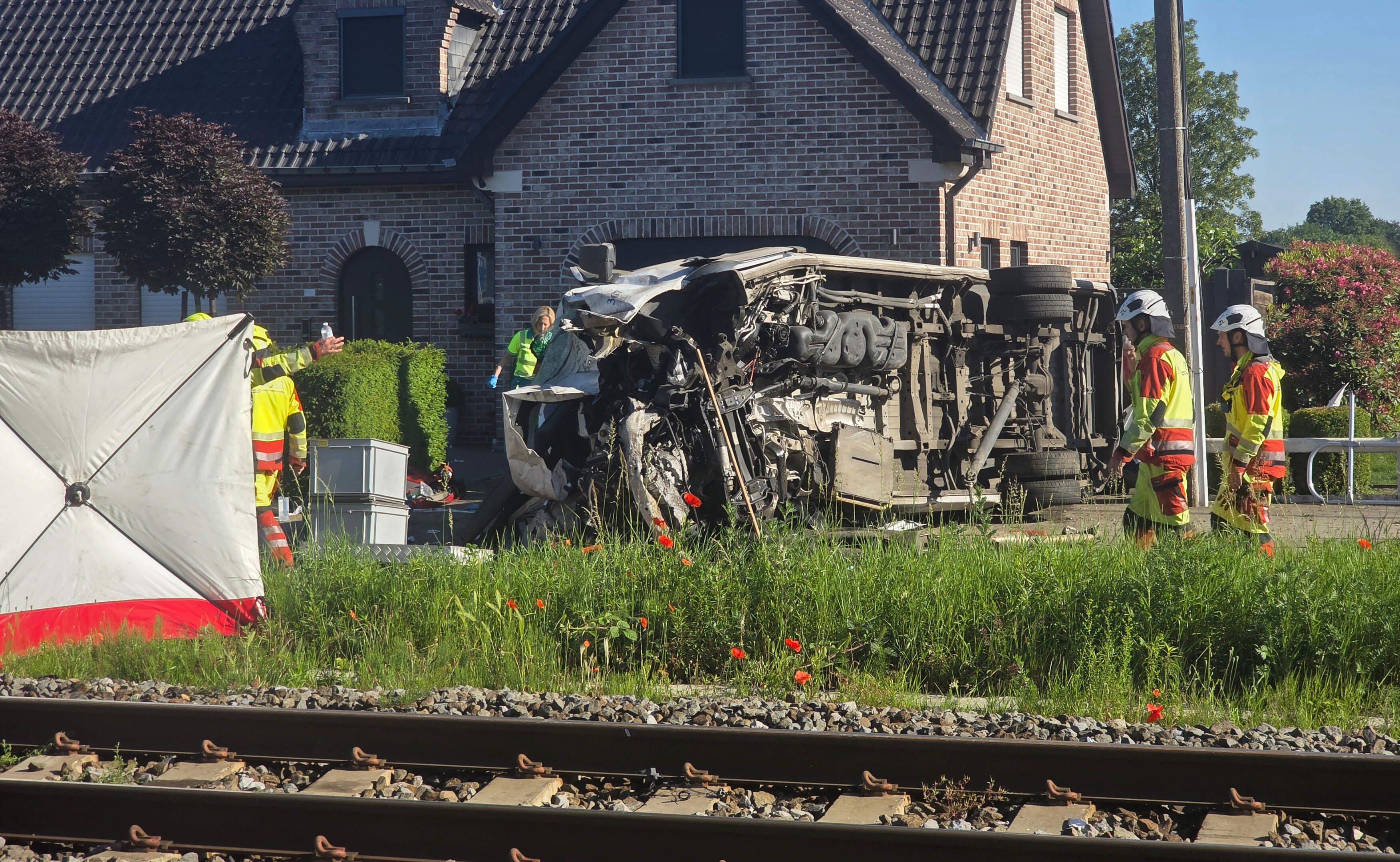 Four people dead after ‘extremely violent’ crash between train and school bus in Belgium