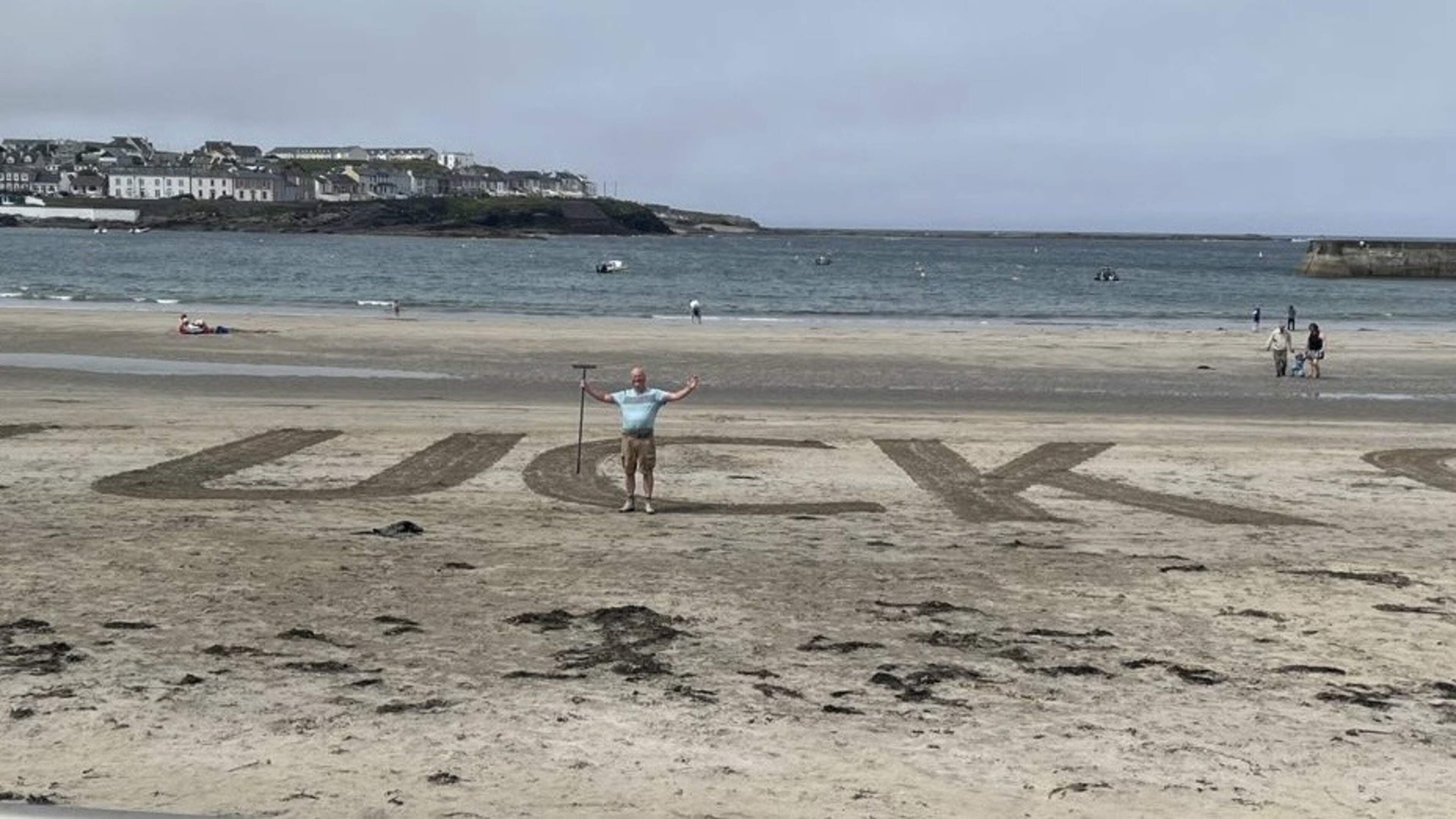 Man behind 20-foot message on Clare beach during GAA match got ‘ribbing’ from divided locals