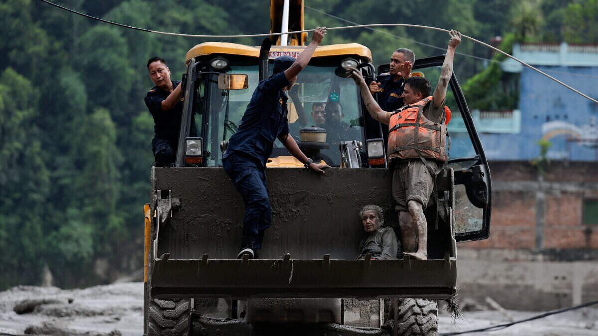Warning of new flood threat as barrier lakes swell and rescue teams struggle to cope with glacier collapse in Nepal