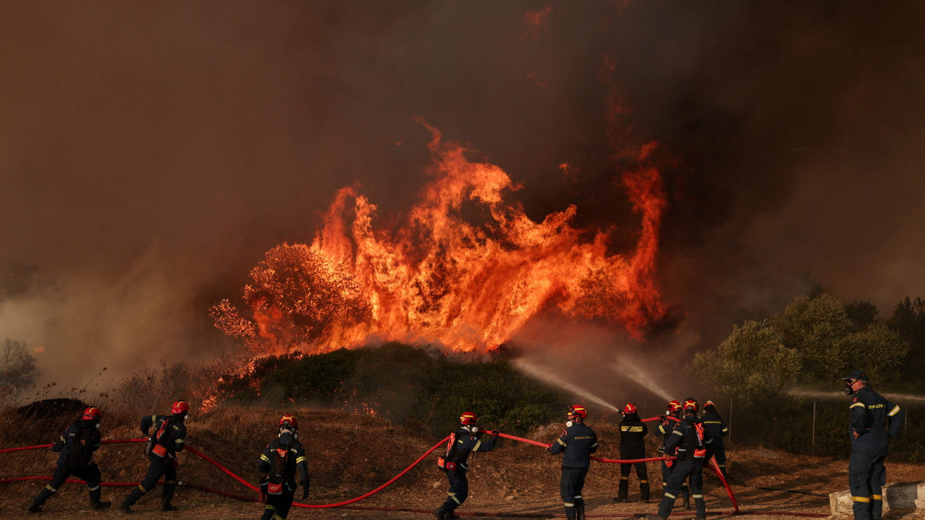 Erratic winds hinder progress as hundreds of firefighters battle wildfire near Athens for fourth day