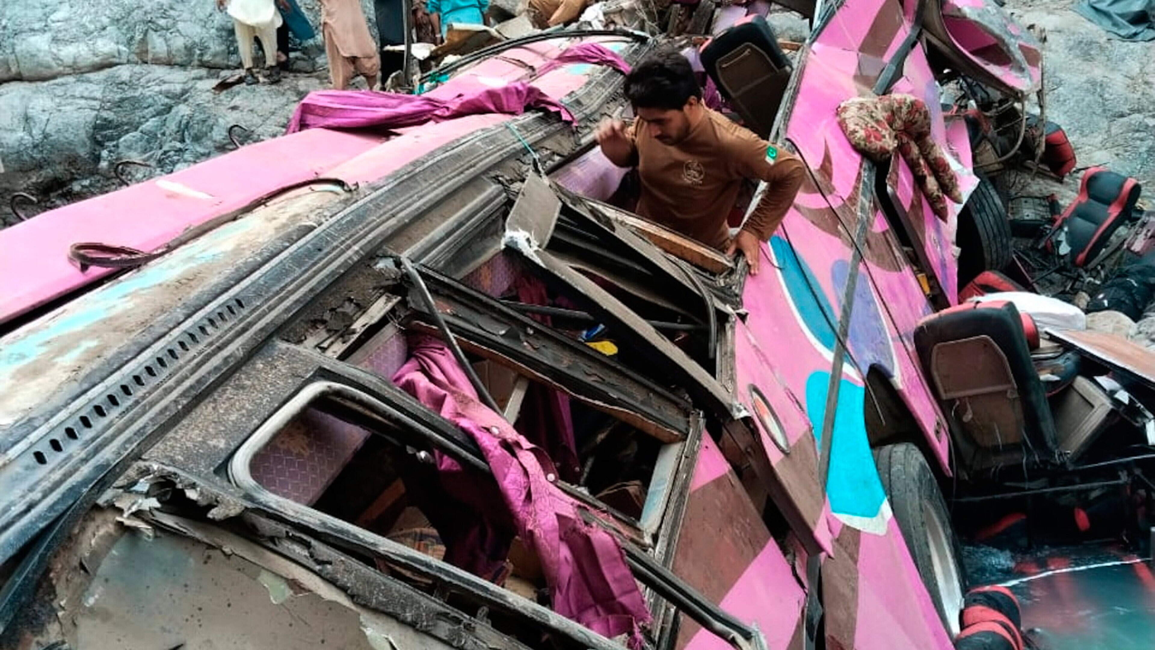 Bus crash kills 40 after ‘passenger grabs driver by neck’