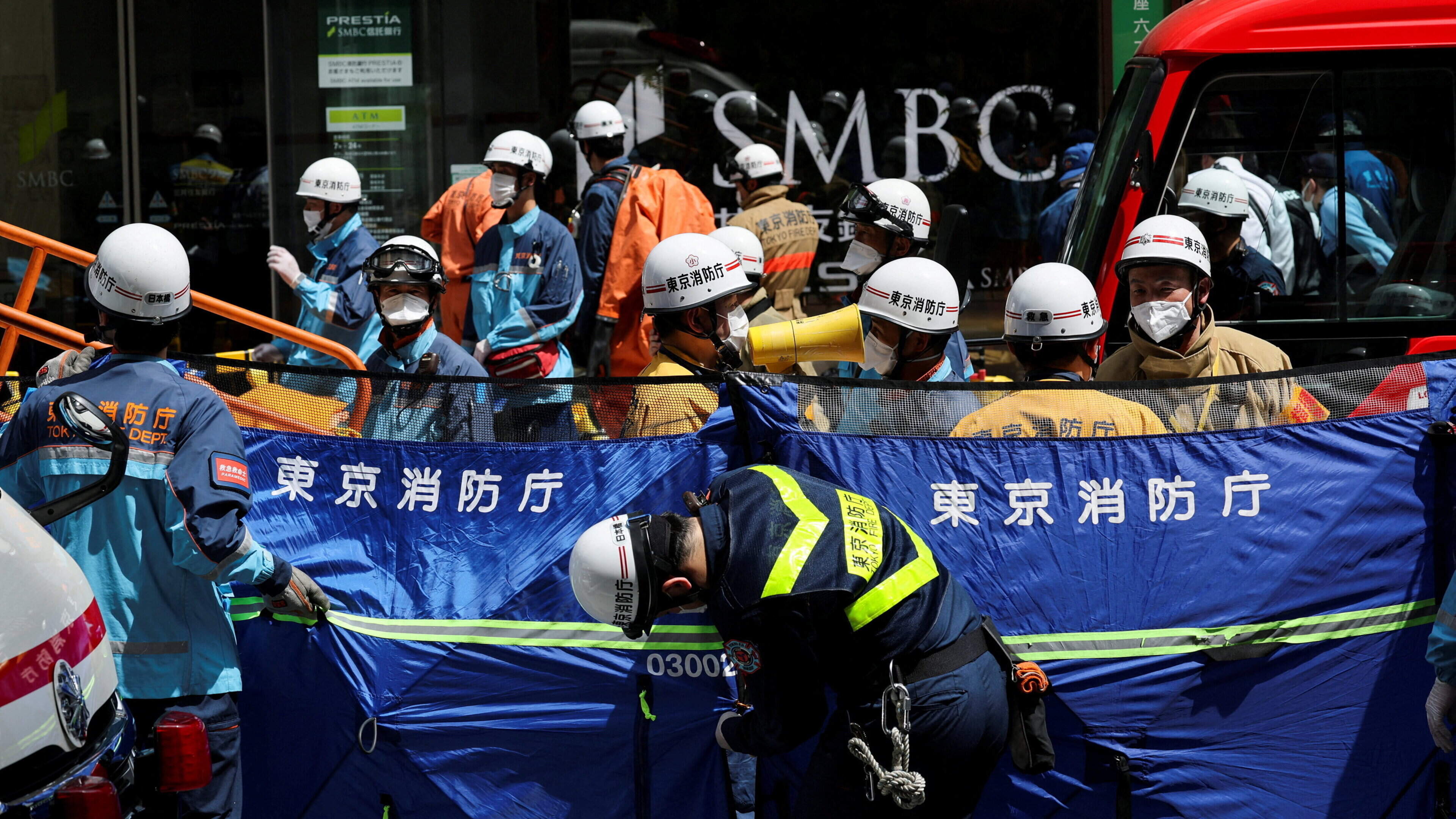 At least 20 people fall ill after man sprays liquid inside Tokyo shopping centre