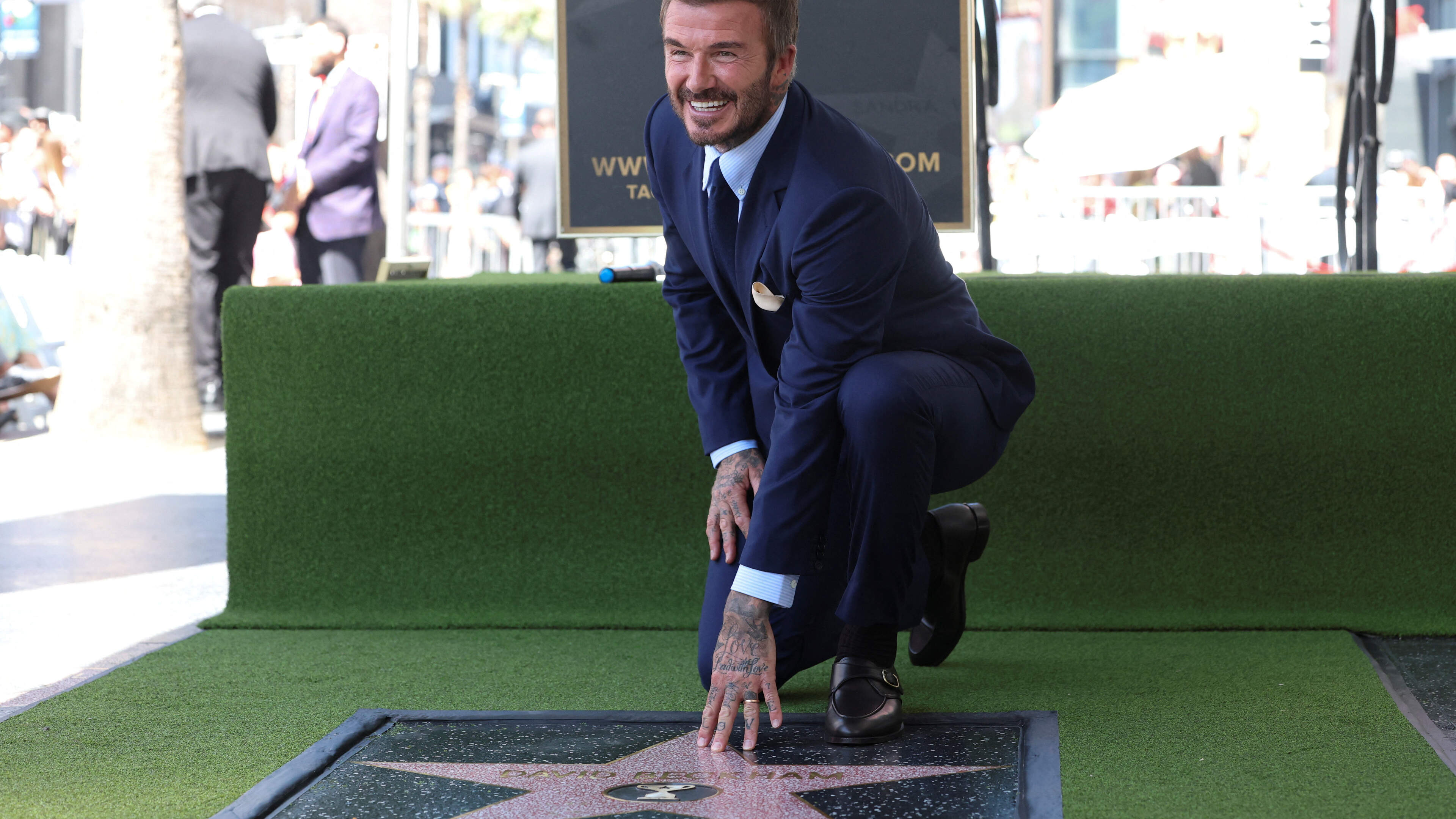 Robbie Keane and wife Claudine show support for David Beckham as he unveils star at Hollywood Walk of Fame