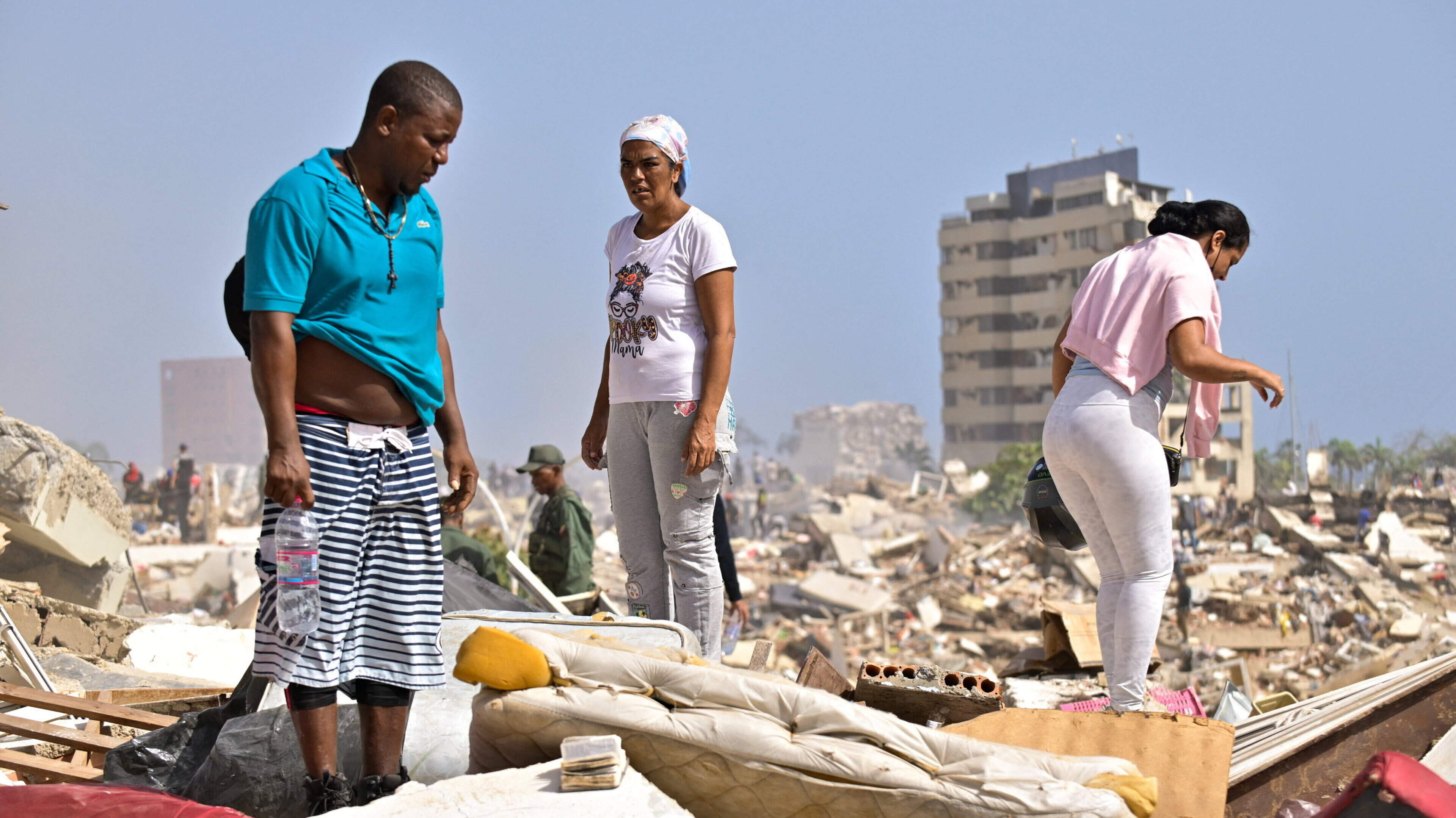 Woman gives birth under rubble amid desperate search for thousands missing in Venezuela earthquakes