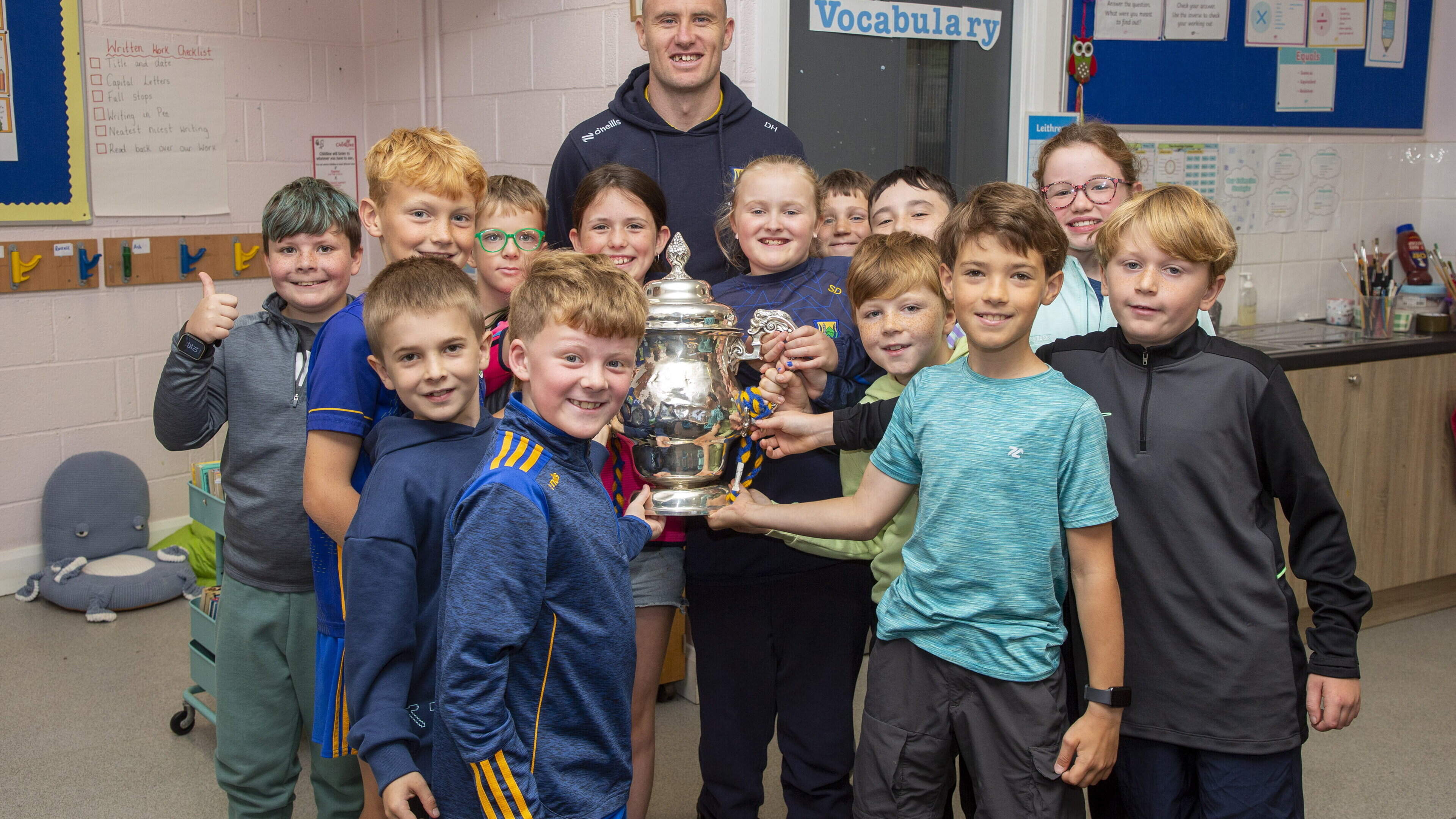Hero’s welcome for Wicklow GAA captain Dean Healy as he visits Wicklow school with Tailteann Cup