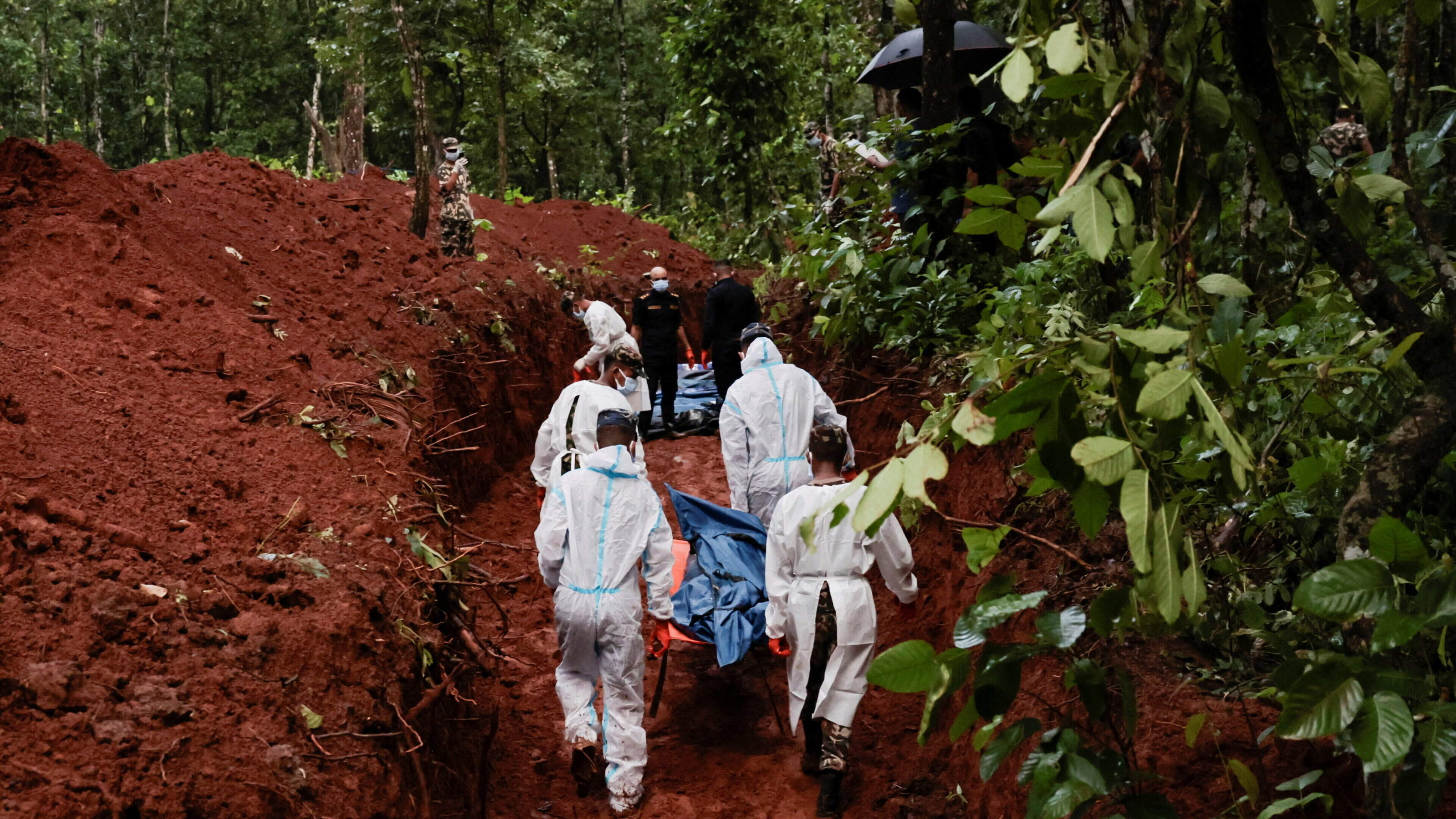 Hundreds of unidentified victims of Nepal floods buried in temporary mass graves