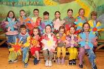 First and Second class pupils on stage for the Rathcoole NS production of The Wizard of Oz 